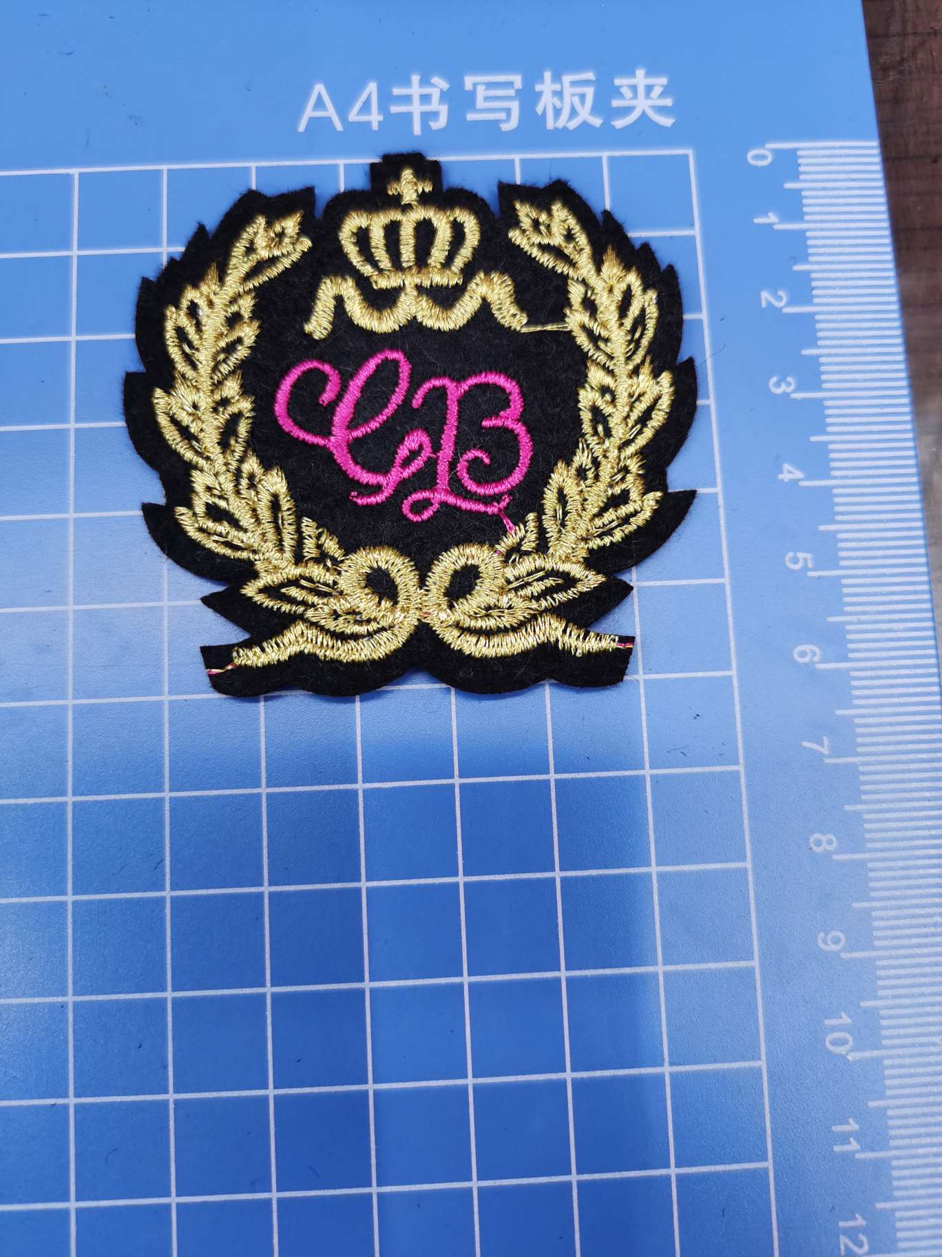 Gold thread badge