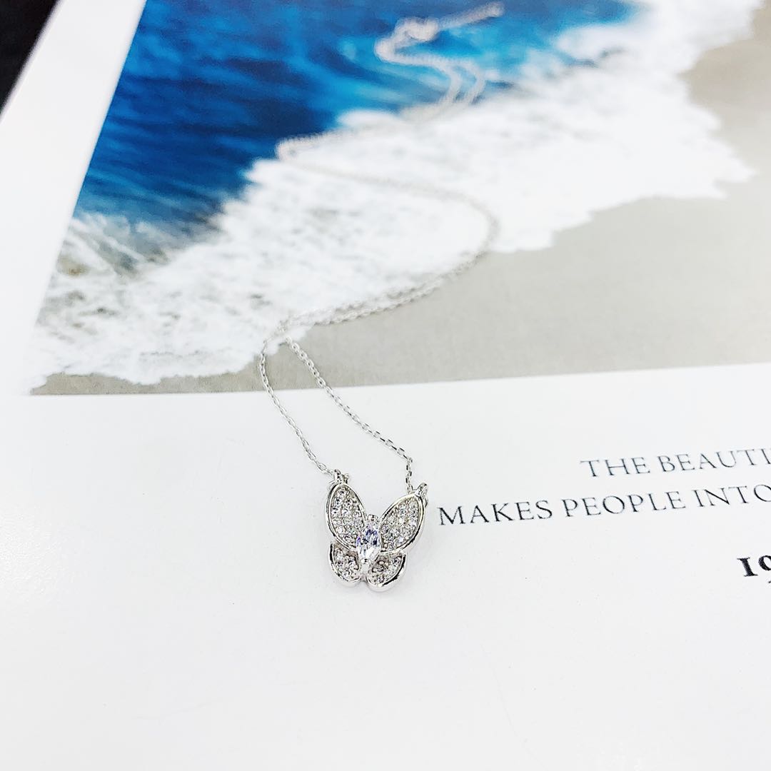 The s925 silver micro-studded butterfly necklace is non-allergenic in white and rose gold undefined
