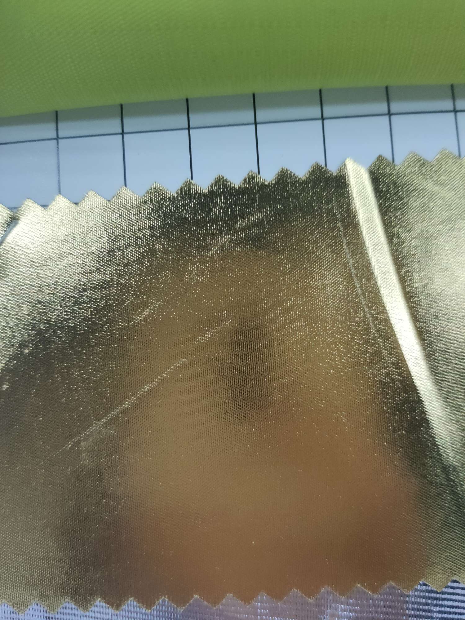 现货供应耐磨烫金烫银面料直播装饰背景布舞台幕布 婚庆装饰金色布料  幻彩镭射演出服箱包烫金面料详情图6