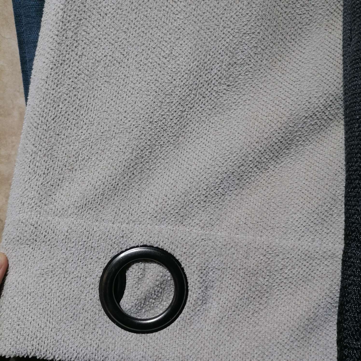 Perforated curtains are white