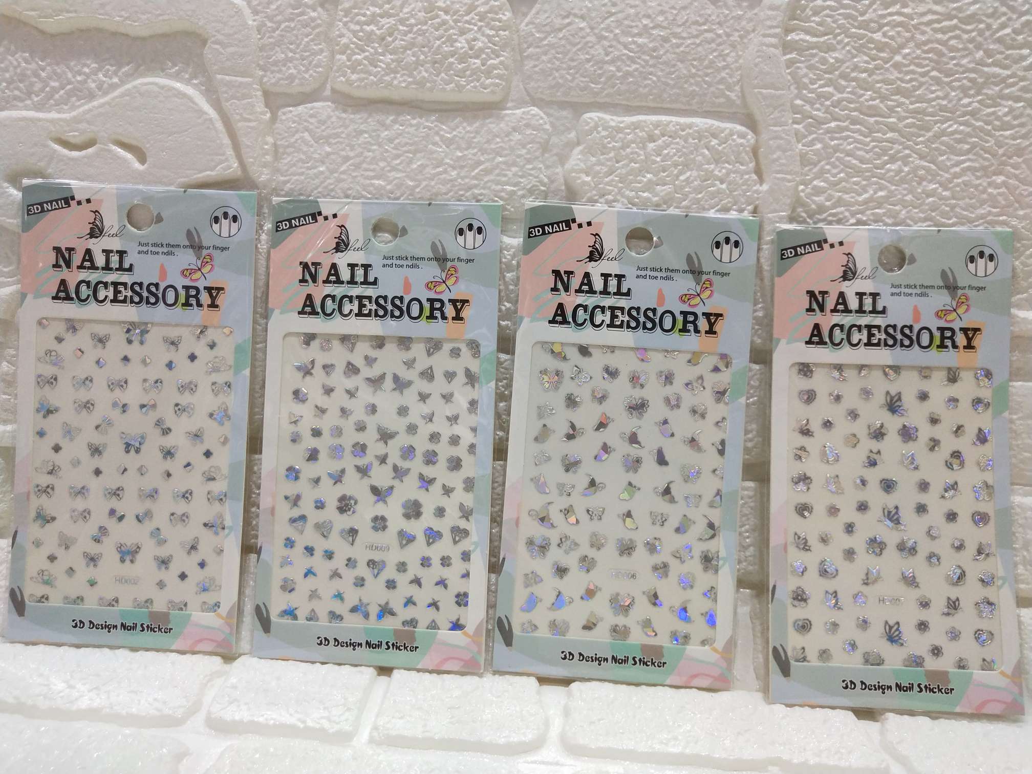 Estilo explosivo simulación de uñas etiqueta de mariposa radium ins viento 3D impermeable adorable hot stamping plata color mariposa uñas pegatinas muchos estilos estilos mezclados Specification image