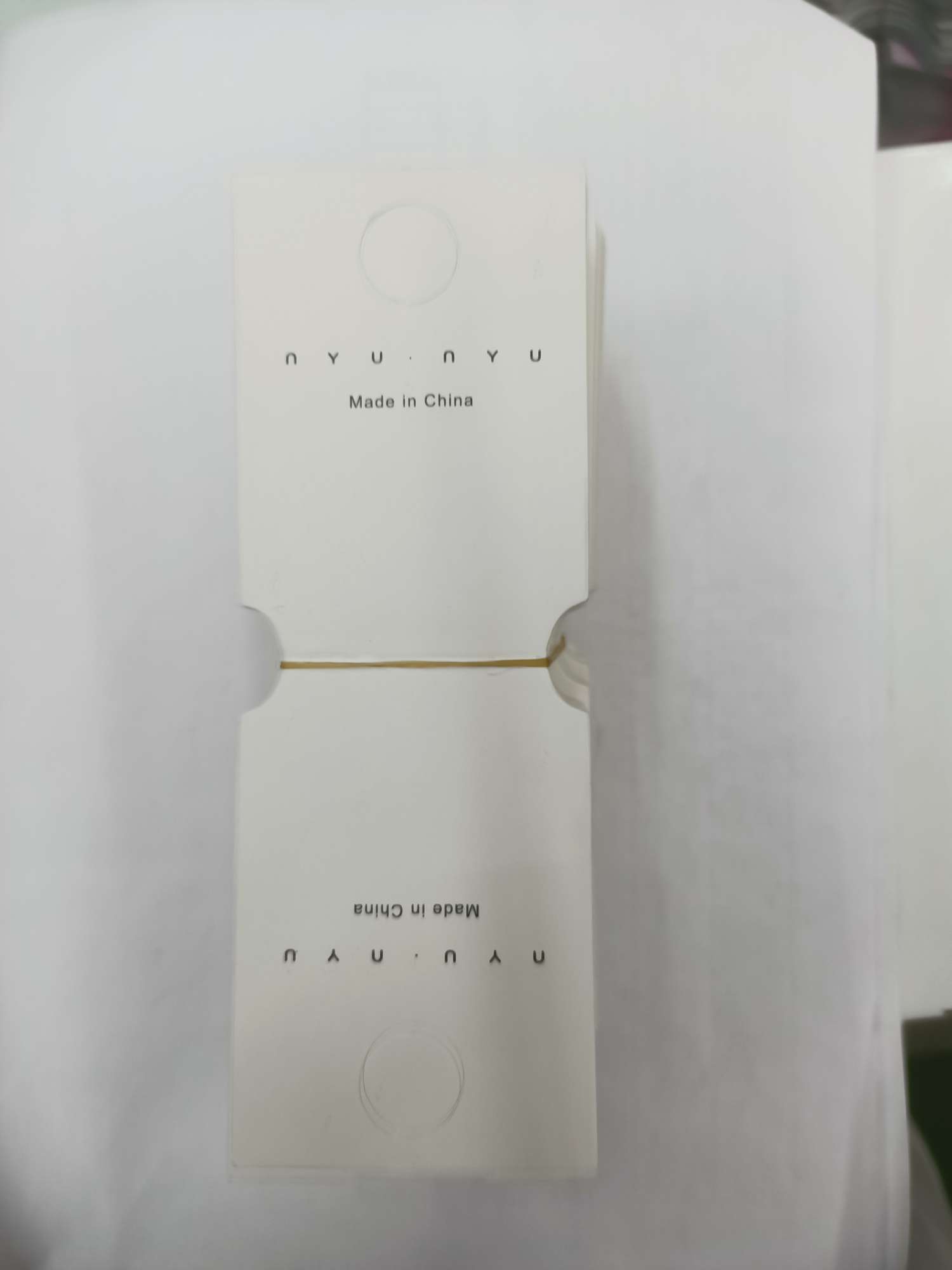 The white card is halved