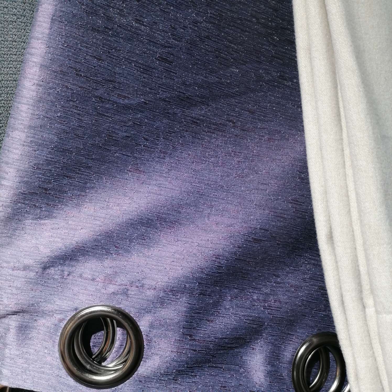 Purple perforated curtains
