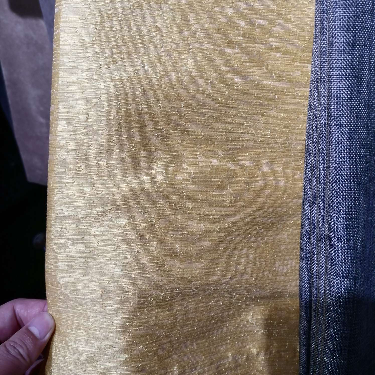 The perforated curtains are plain brown