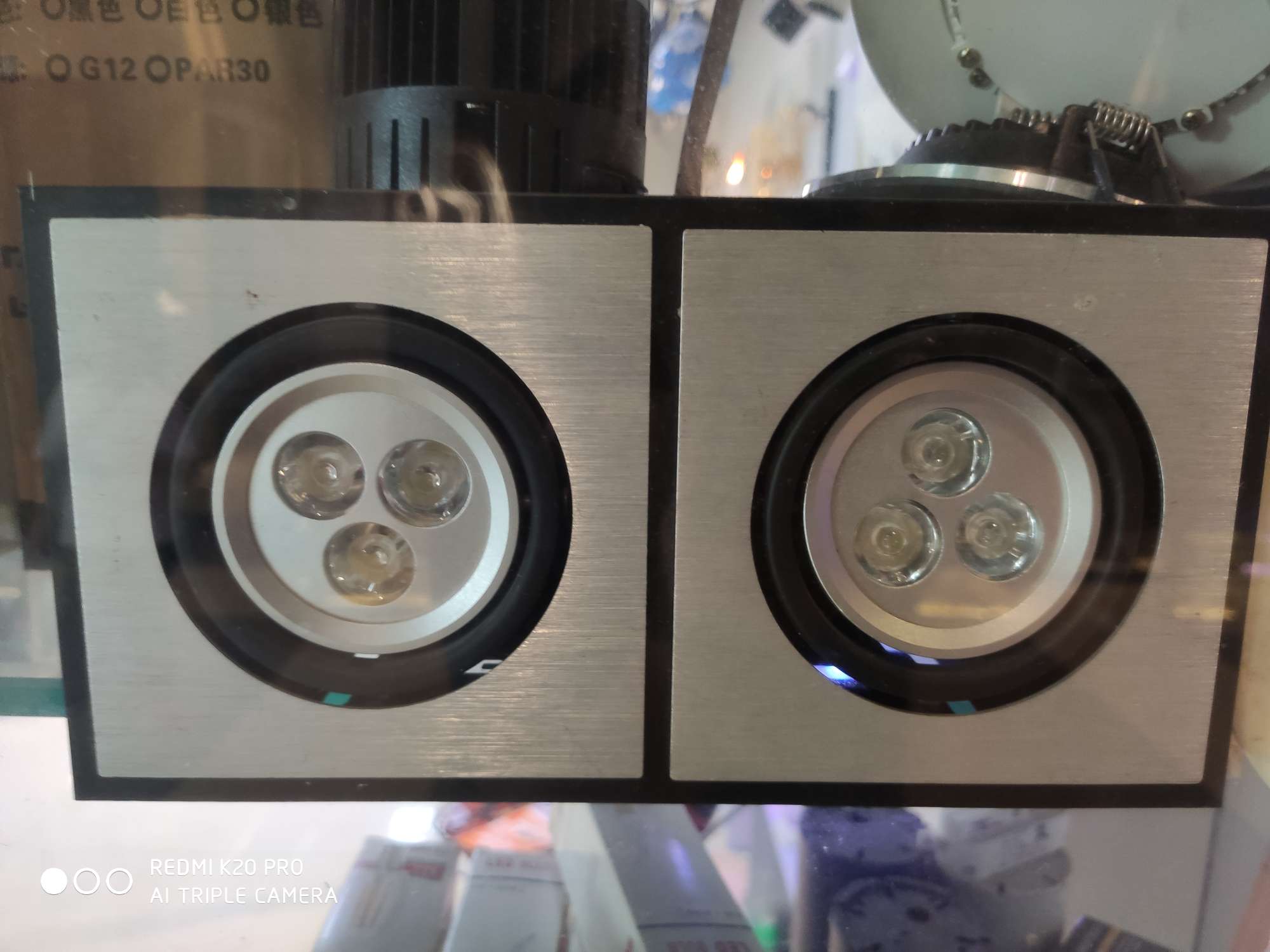 Double-headed ceiling downlight