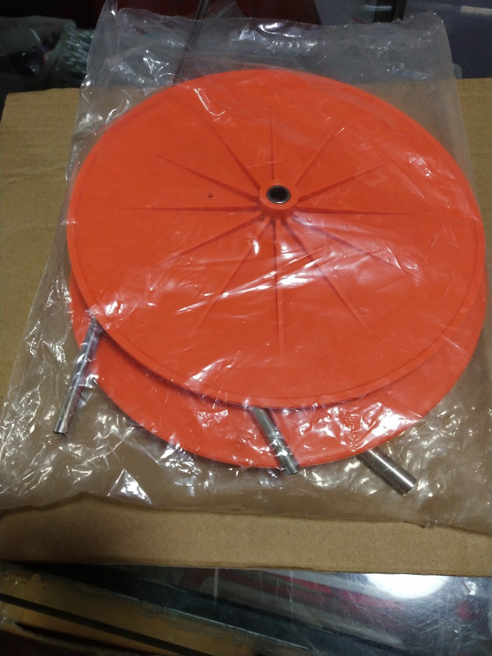 Direct sales of industrial sewing machine accessory edge-wrapped discs from the manufacturer. Edge-wrapped plastic discs