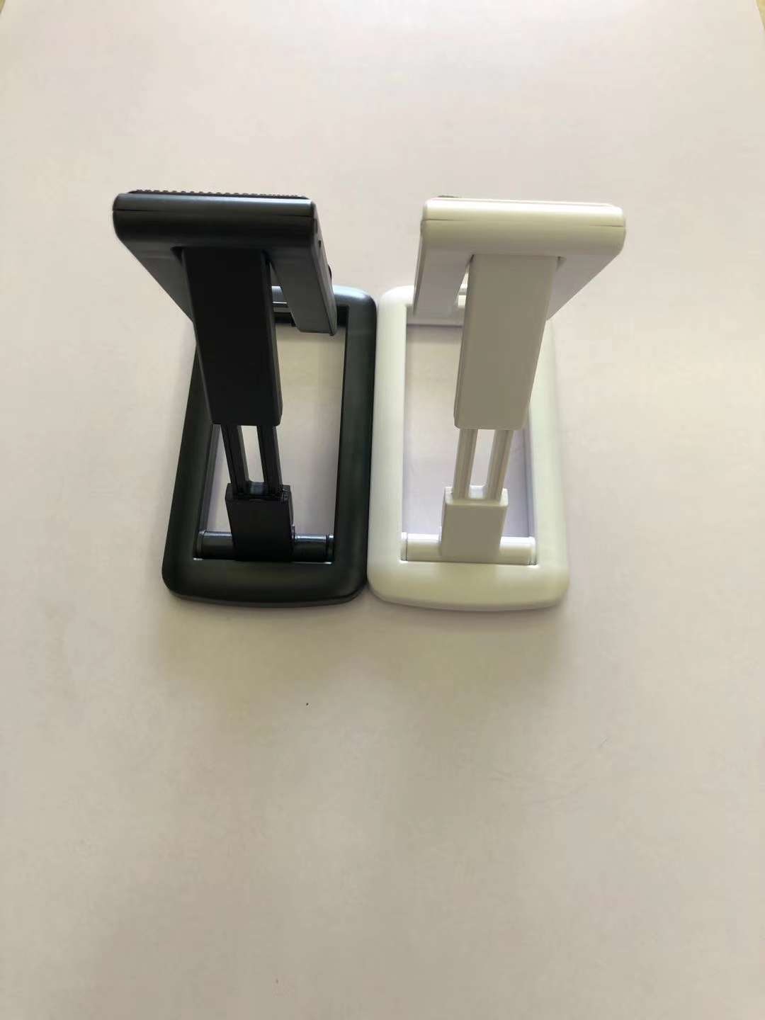 Mobile phone desktop stand can be folded to receive A - 32 thumbnail