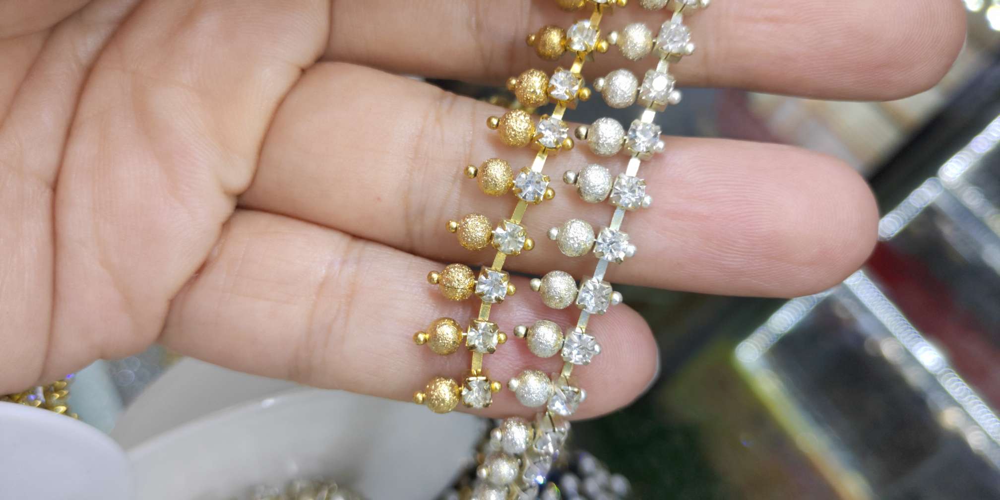 Single row drill out sand beads