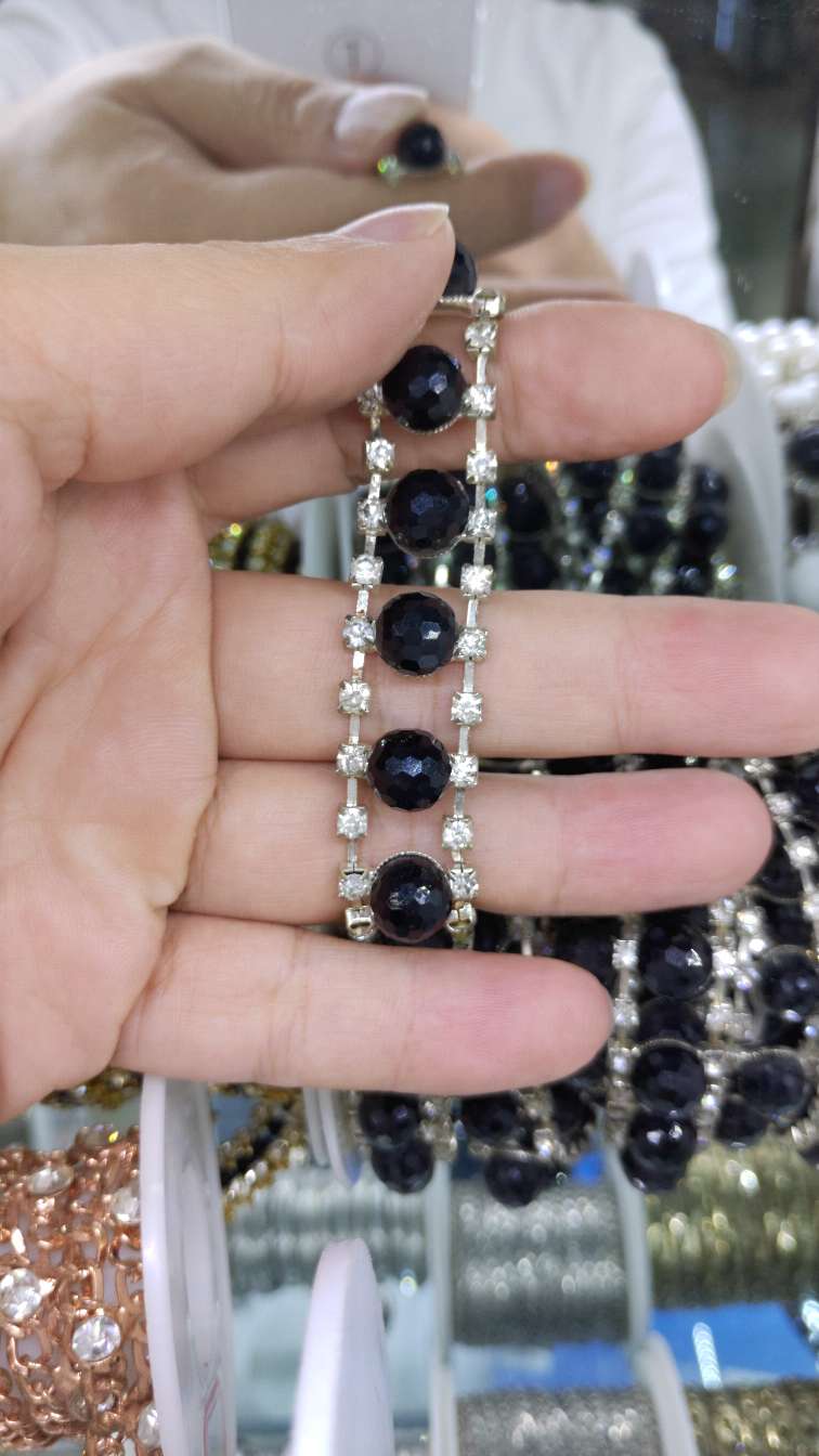 Double row drill clip black earth bead