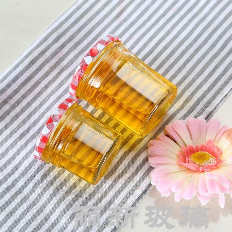 Sealed glass honey pickles and jam bottle undefined