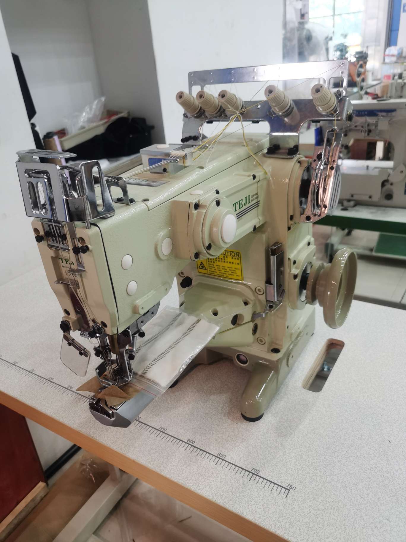 The special machine VT1500 features three needles and five threads