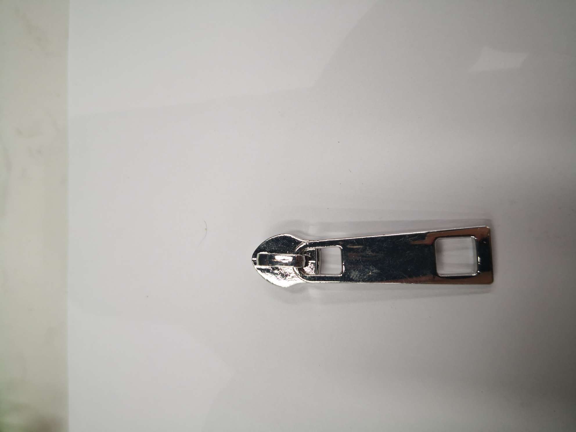 光片拉头 挂镀白镍产品图