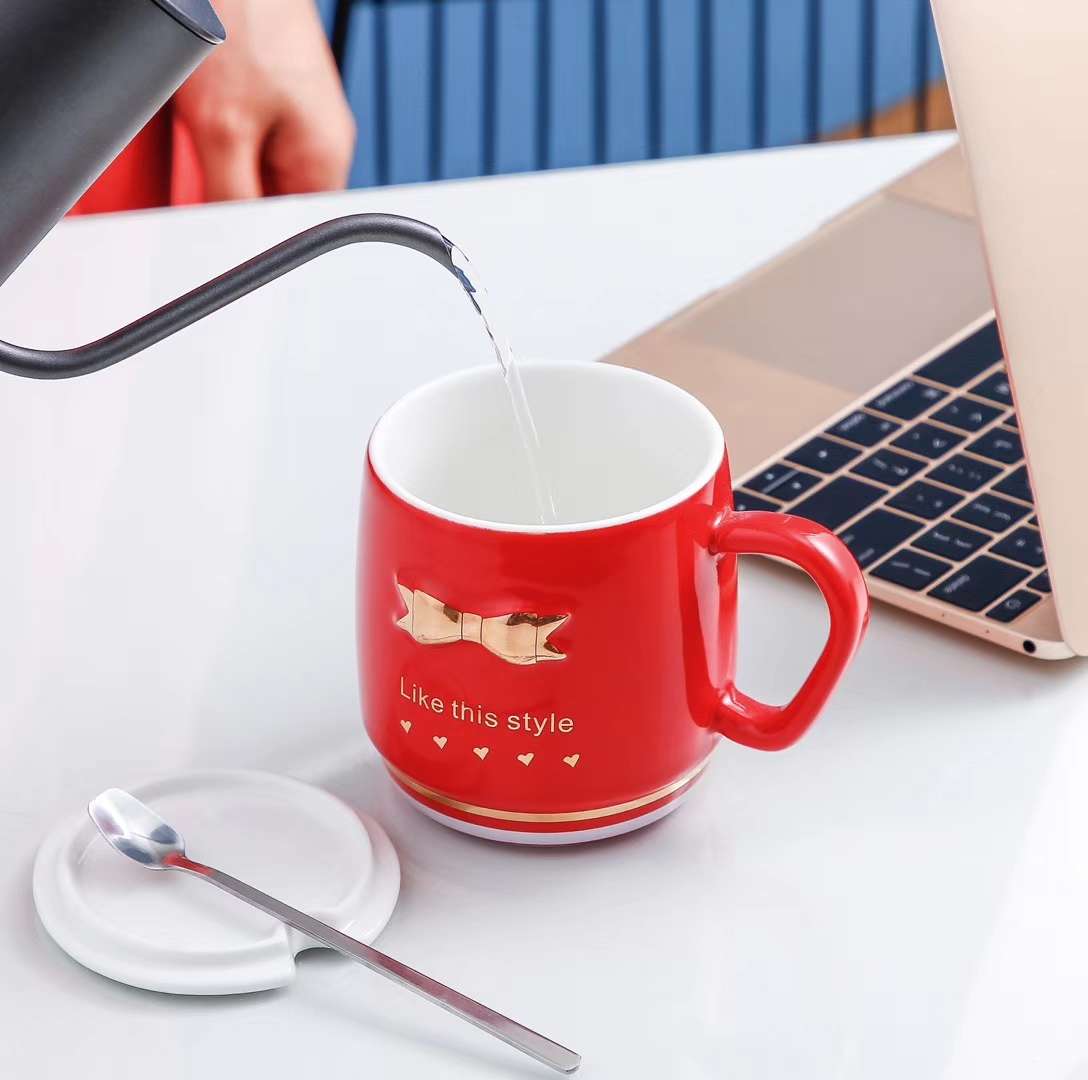 HY991 480ml embossed gilded bow Ceramic cup, glossy glazed Ceramic cup, Ceramic lid, stainless steel spoon undefined