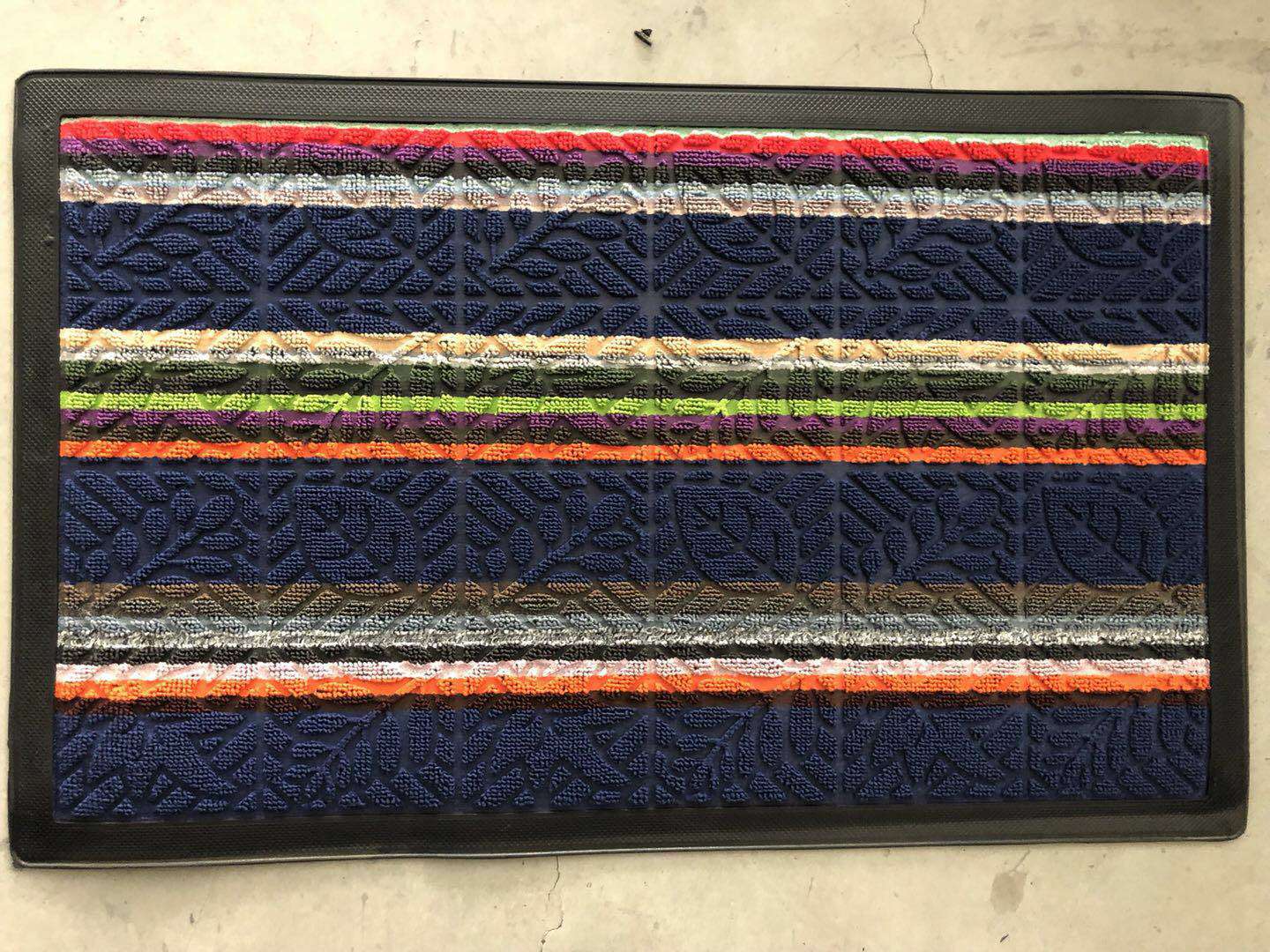 Colorful looped velvet door mat