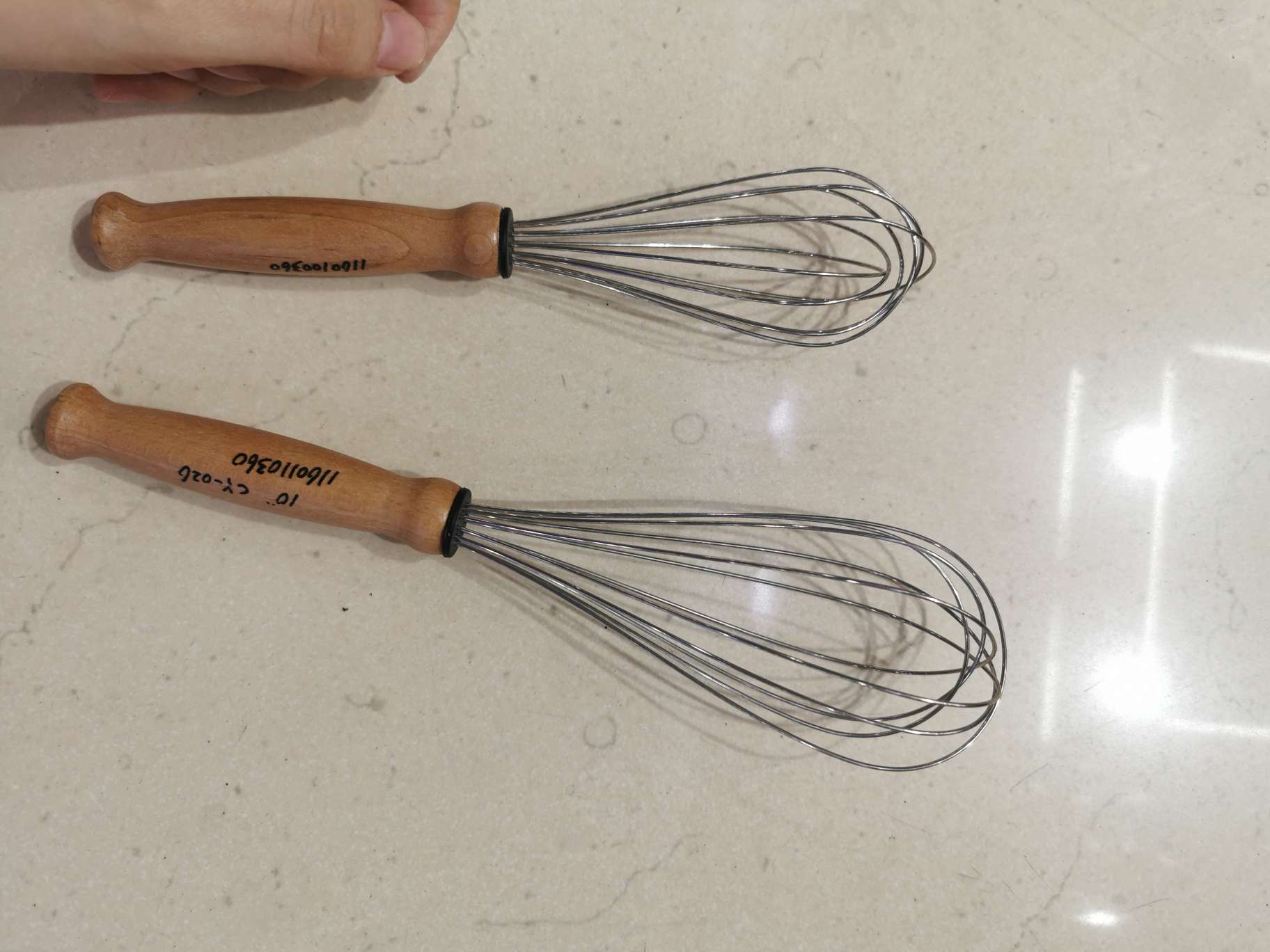 Eggbeater with wooden handle