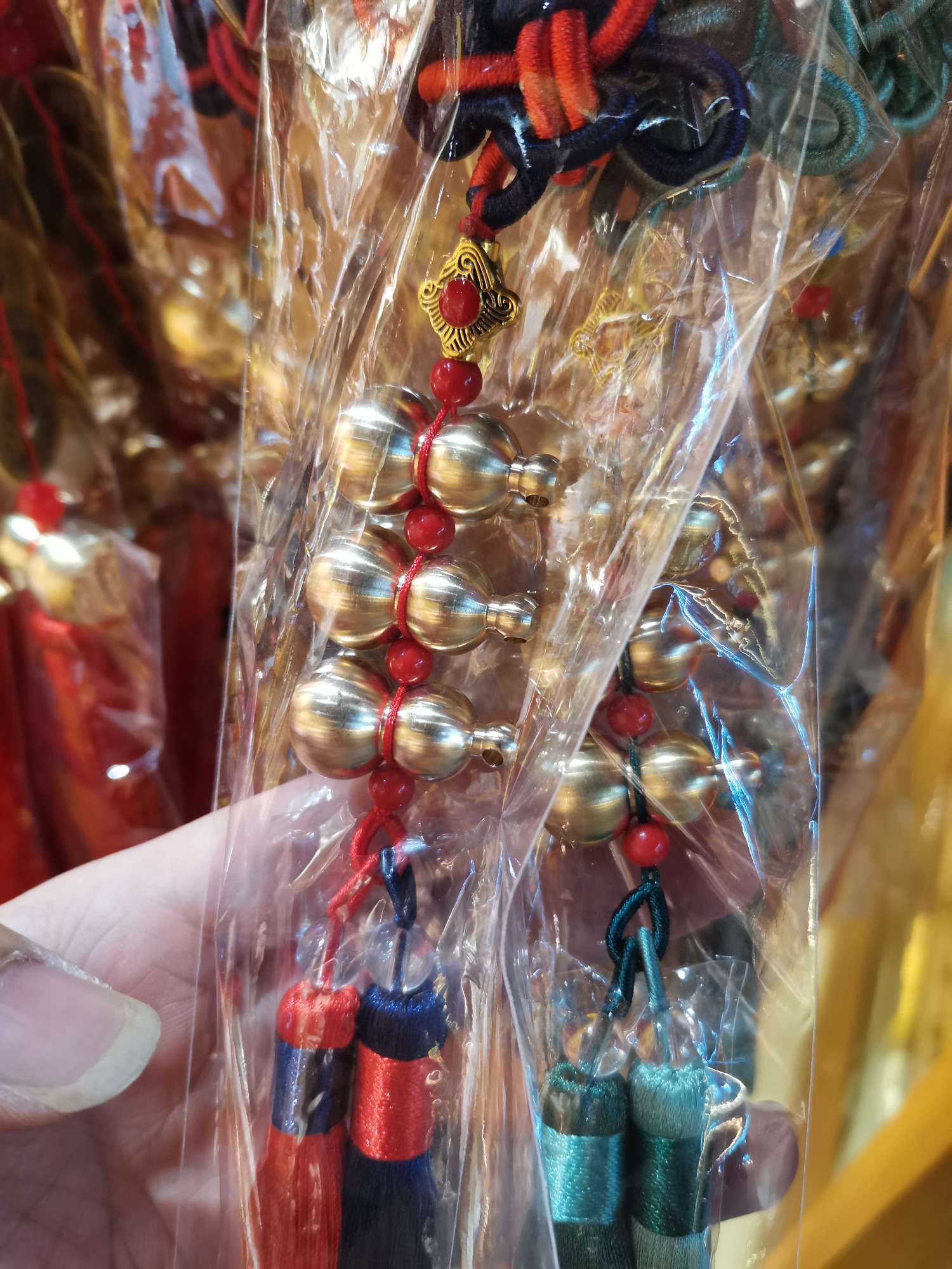 Three string gourd pendants