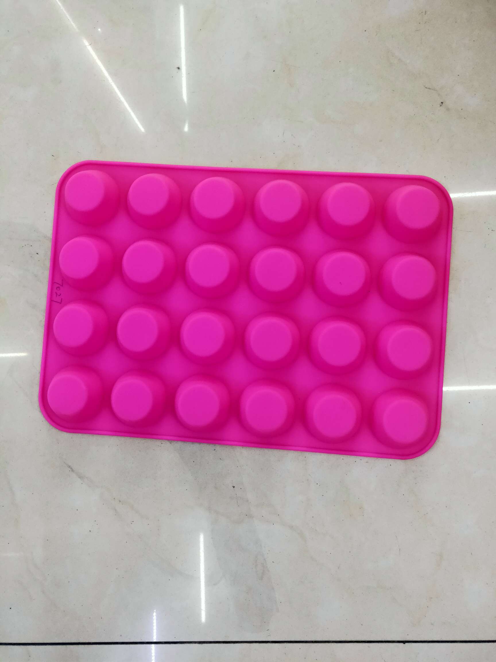 7027