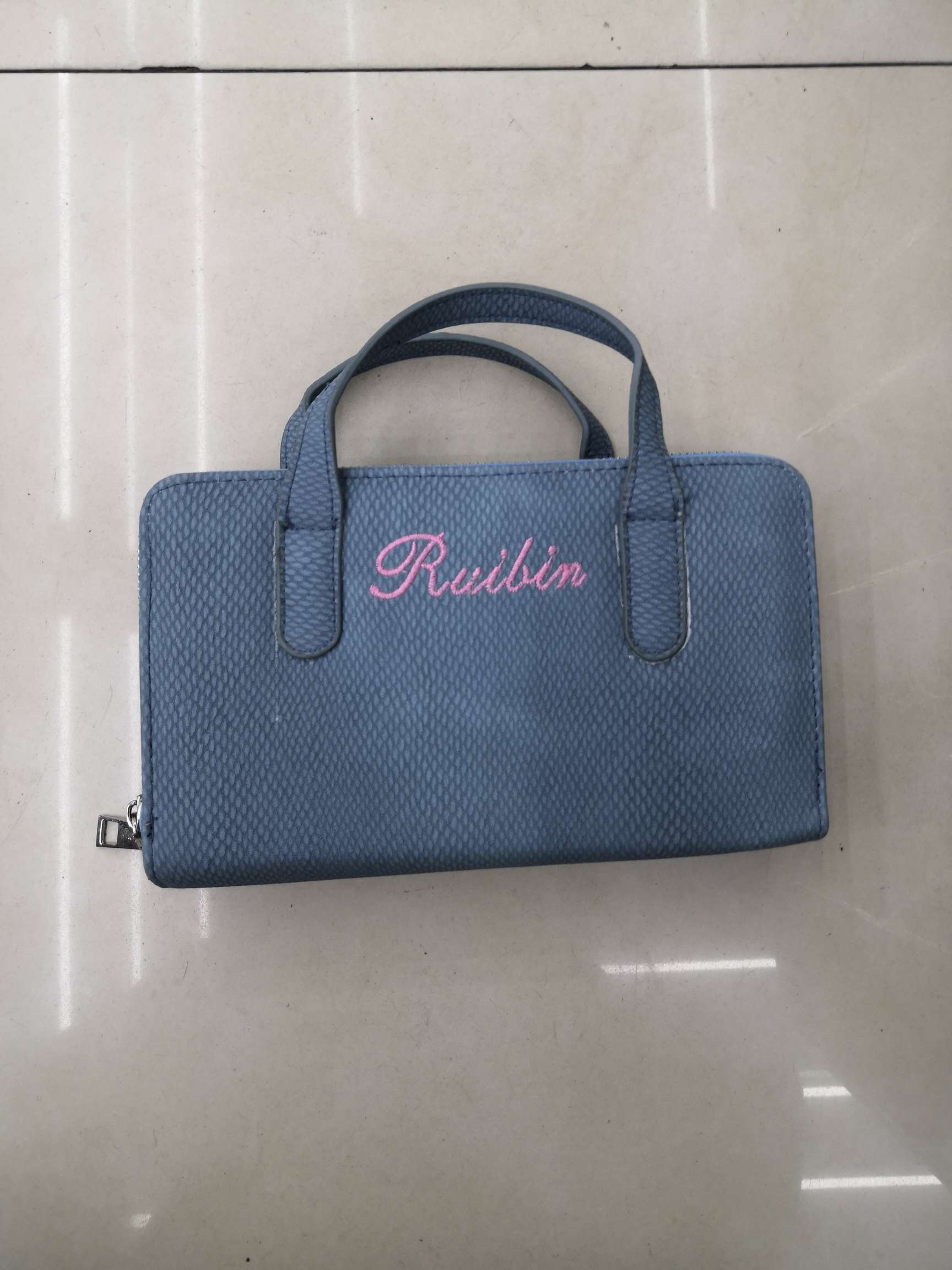 手提单肩包细节图