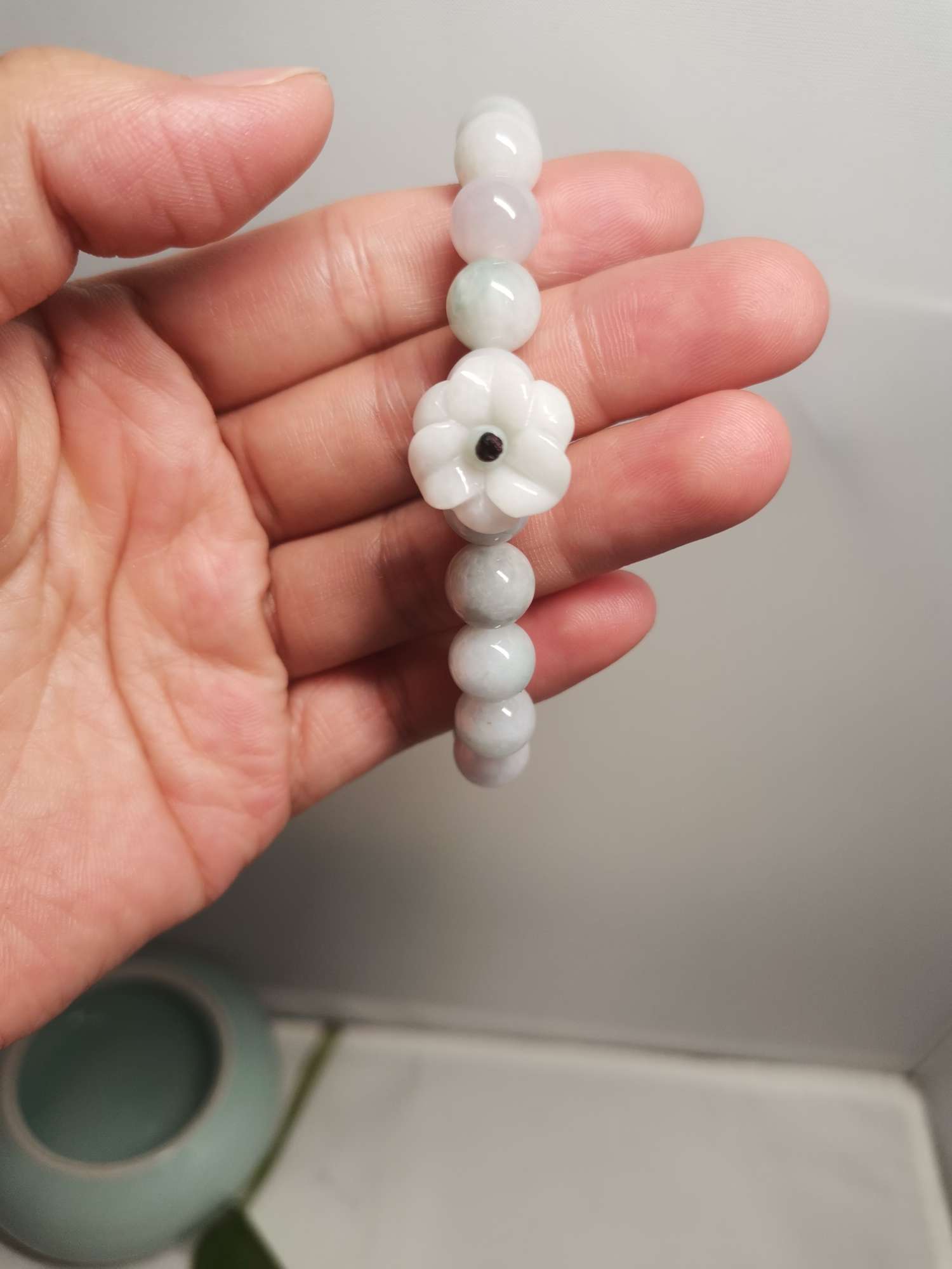 Burmese jadeite jade. Flower 🌸 open with a silver spoon in her mouth thumbnail