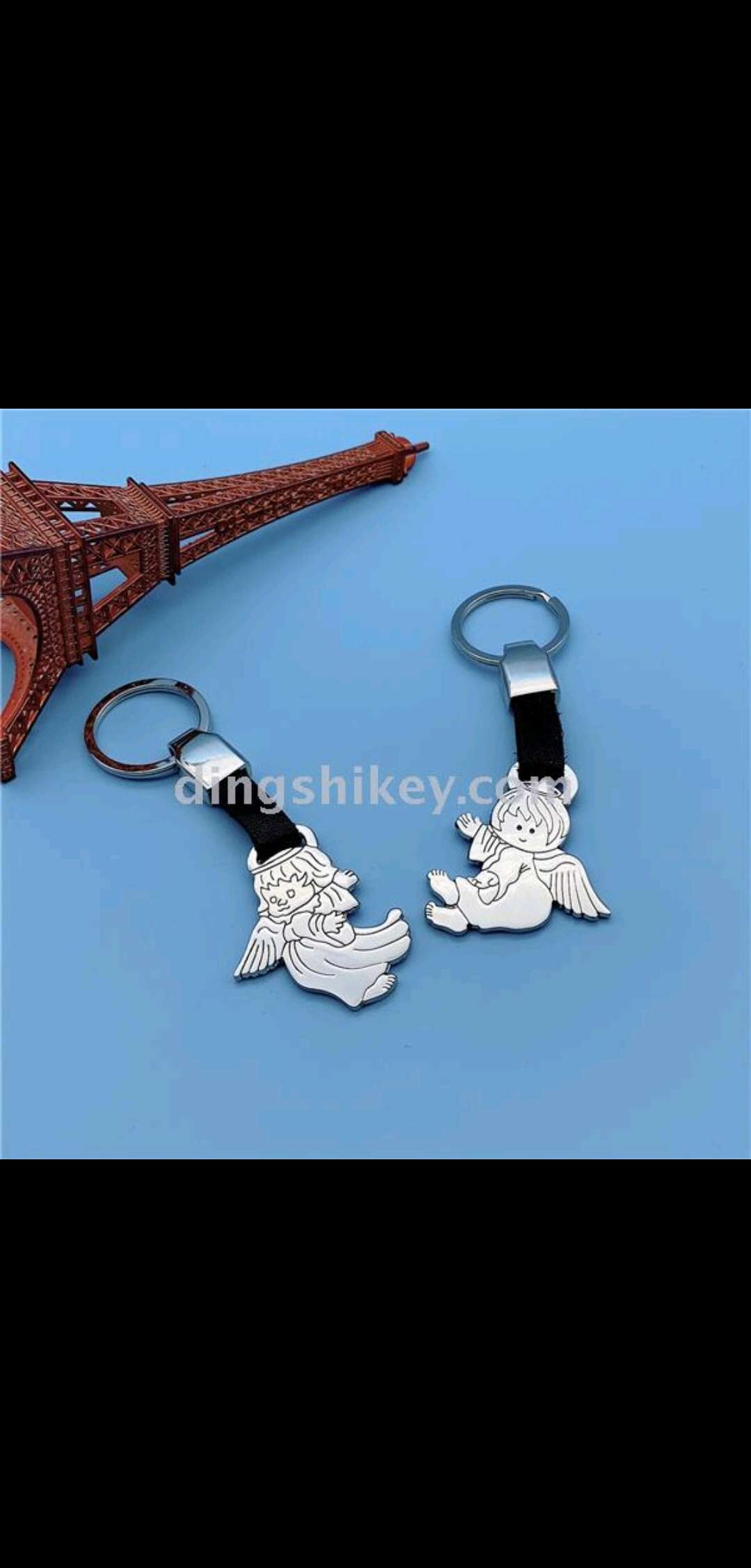 Zinc alloy keychain with leather pendant details Picture