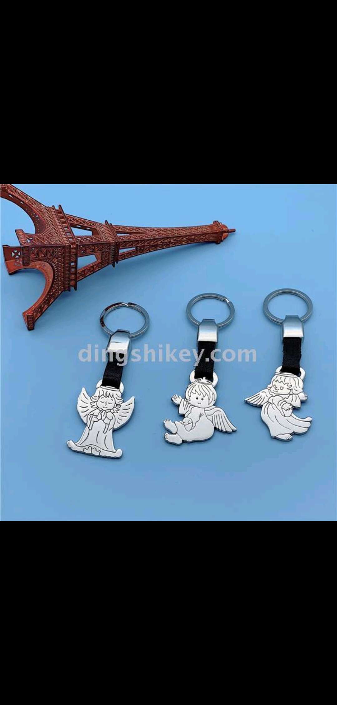 Zinc alloy keychain with leather pendant