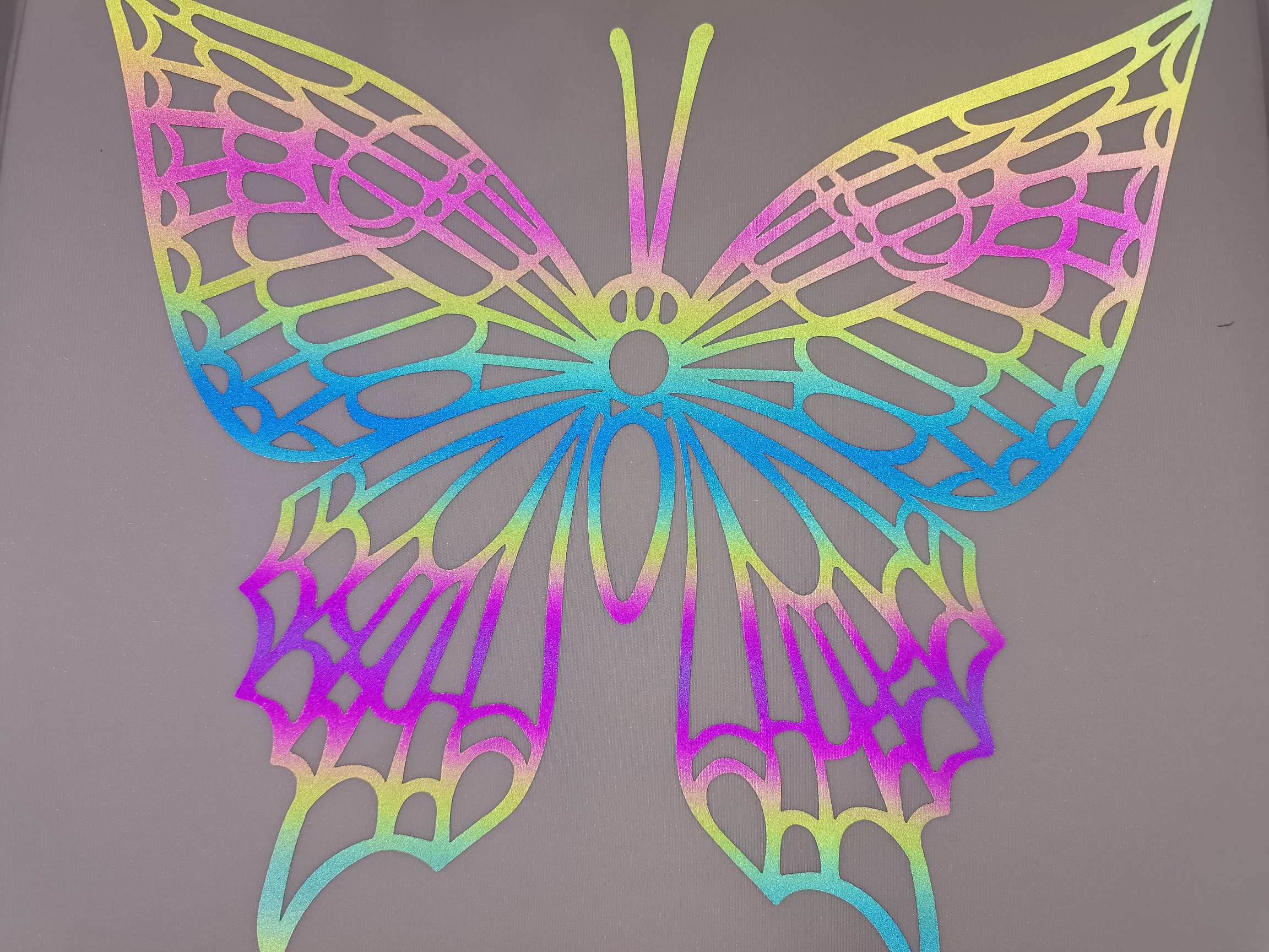 Butterfly Seven-color segment color Dazzling color PU engraving film, engraving film Hot stamping pattern PVC engraving film, TPU engraving film, scallion powder engraving film, reflective engraving film, segment color reflective film, Luminous engraving film Item Picture