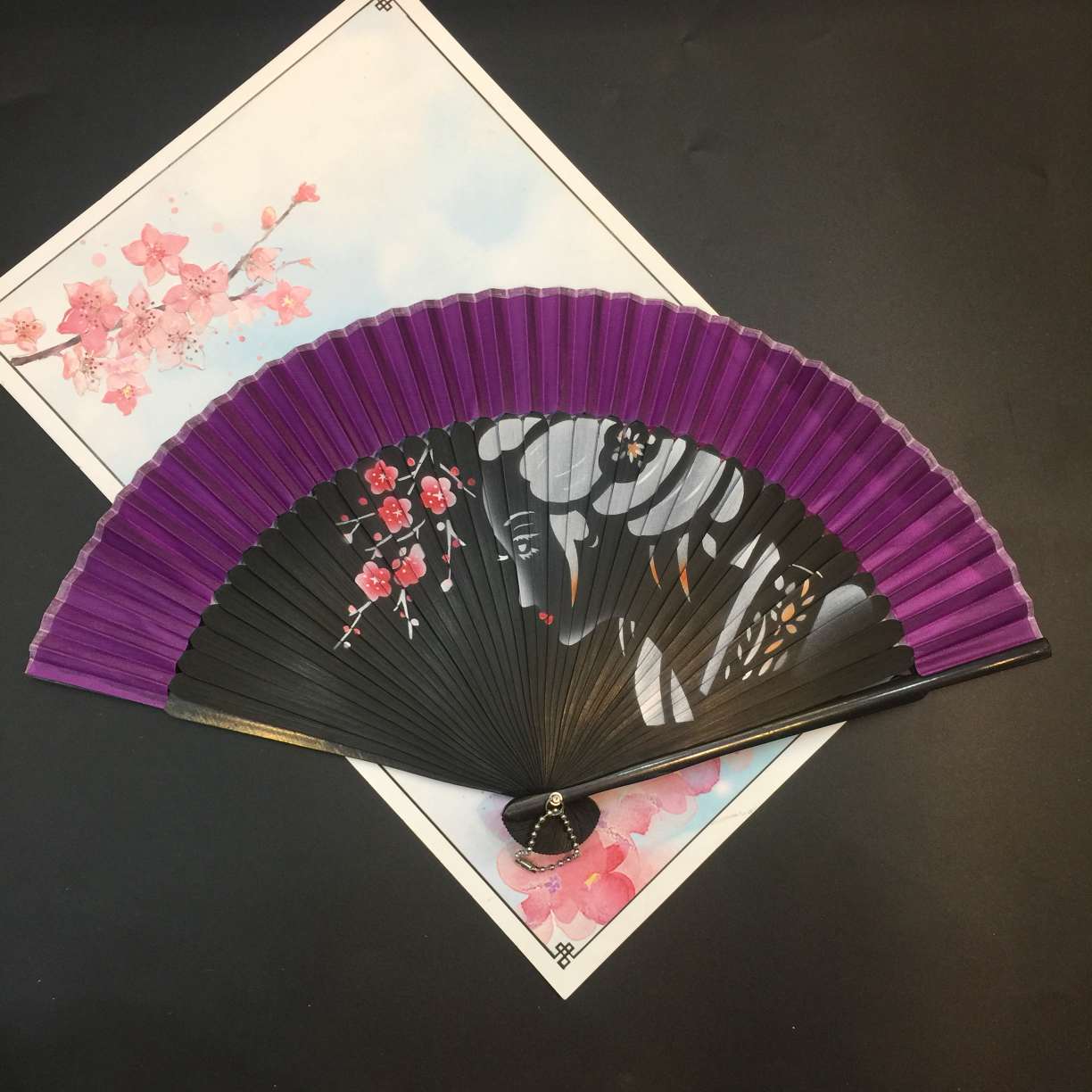 头青喷绘扇白底实物图