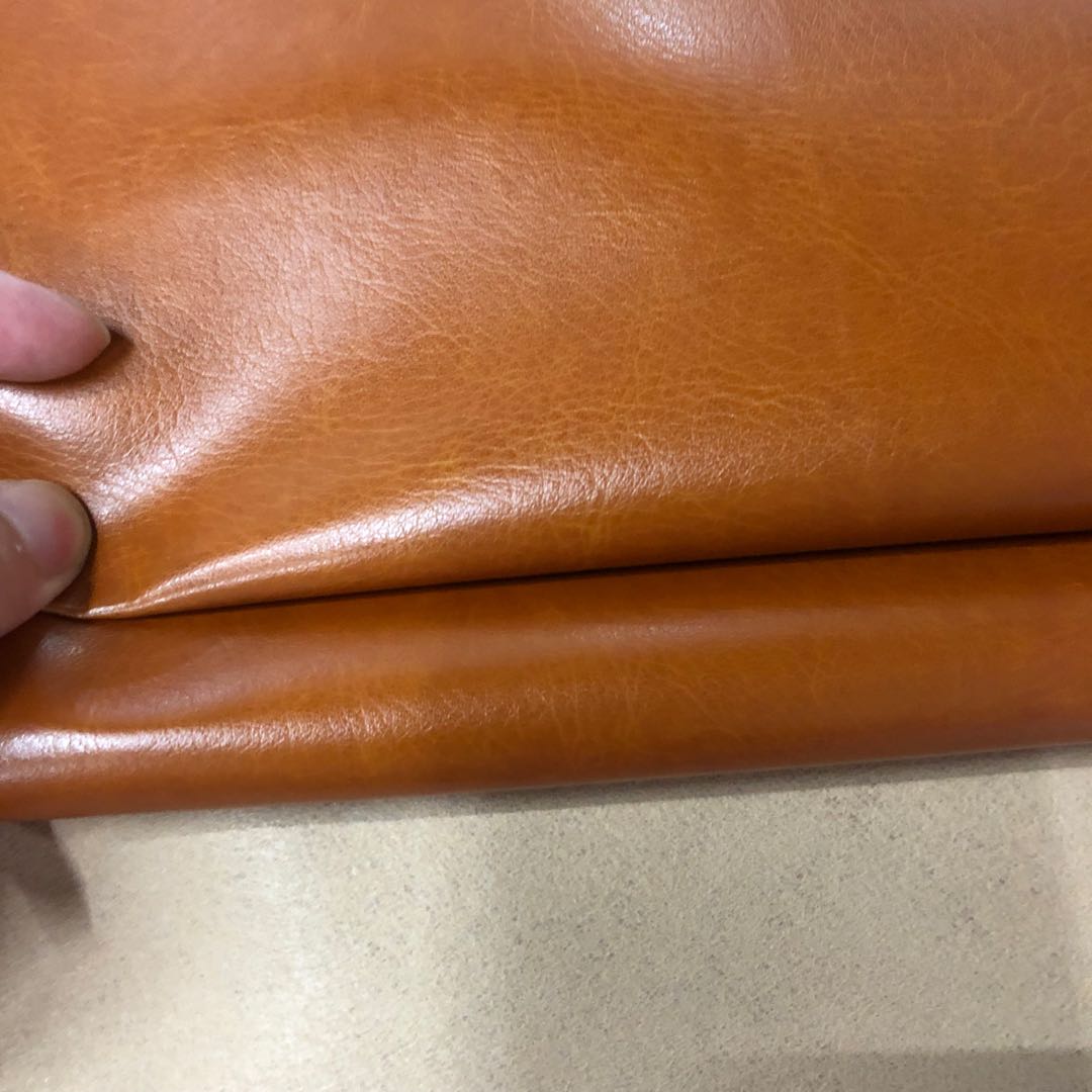 Factory direct sales of pressed PU leather brand leather crystal cowhide bag fabric Application Scenario