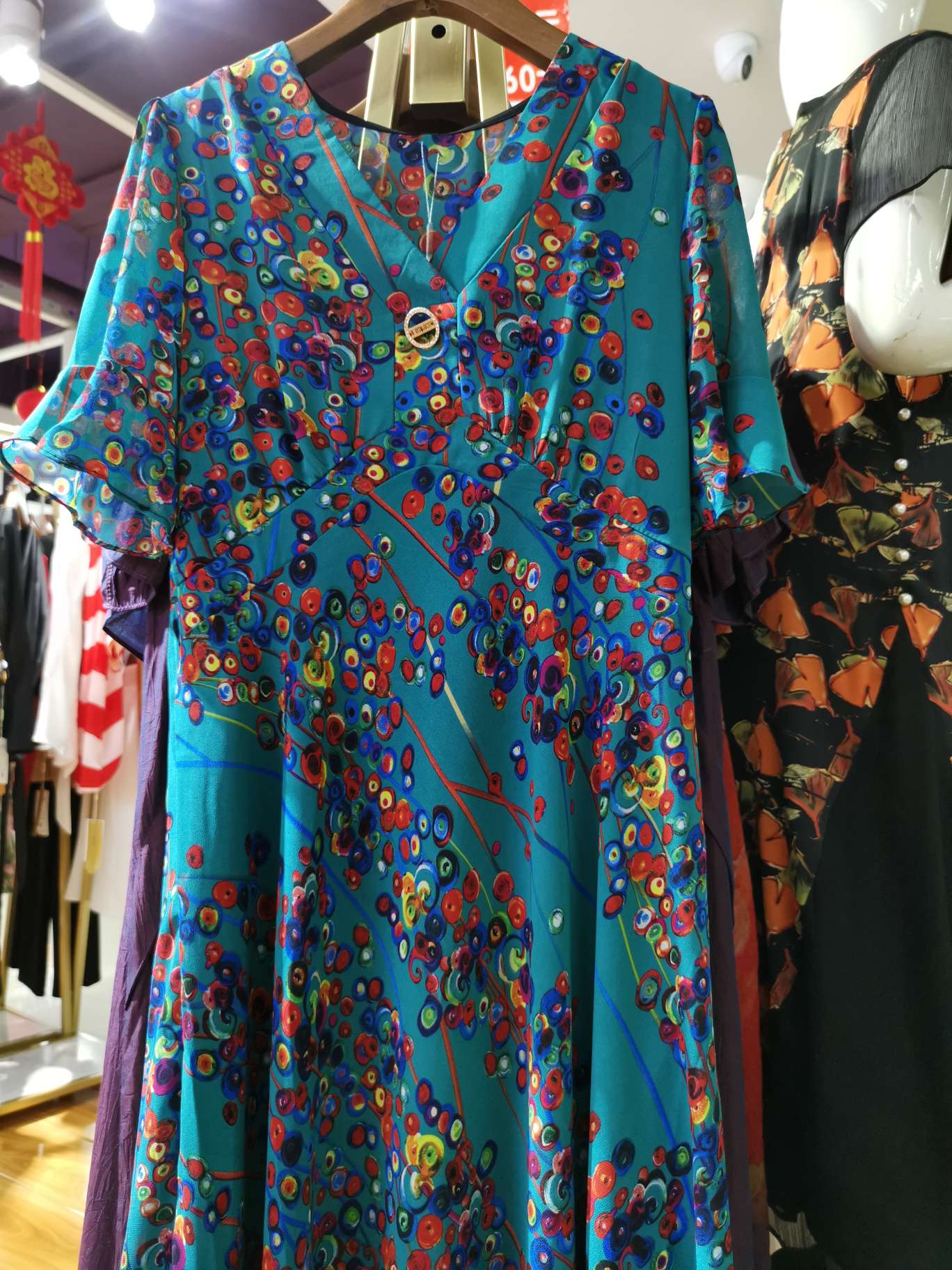 A fashionable dress with bright blue polka dots