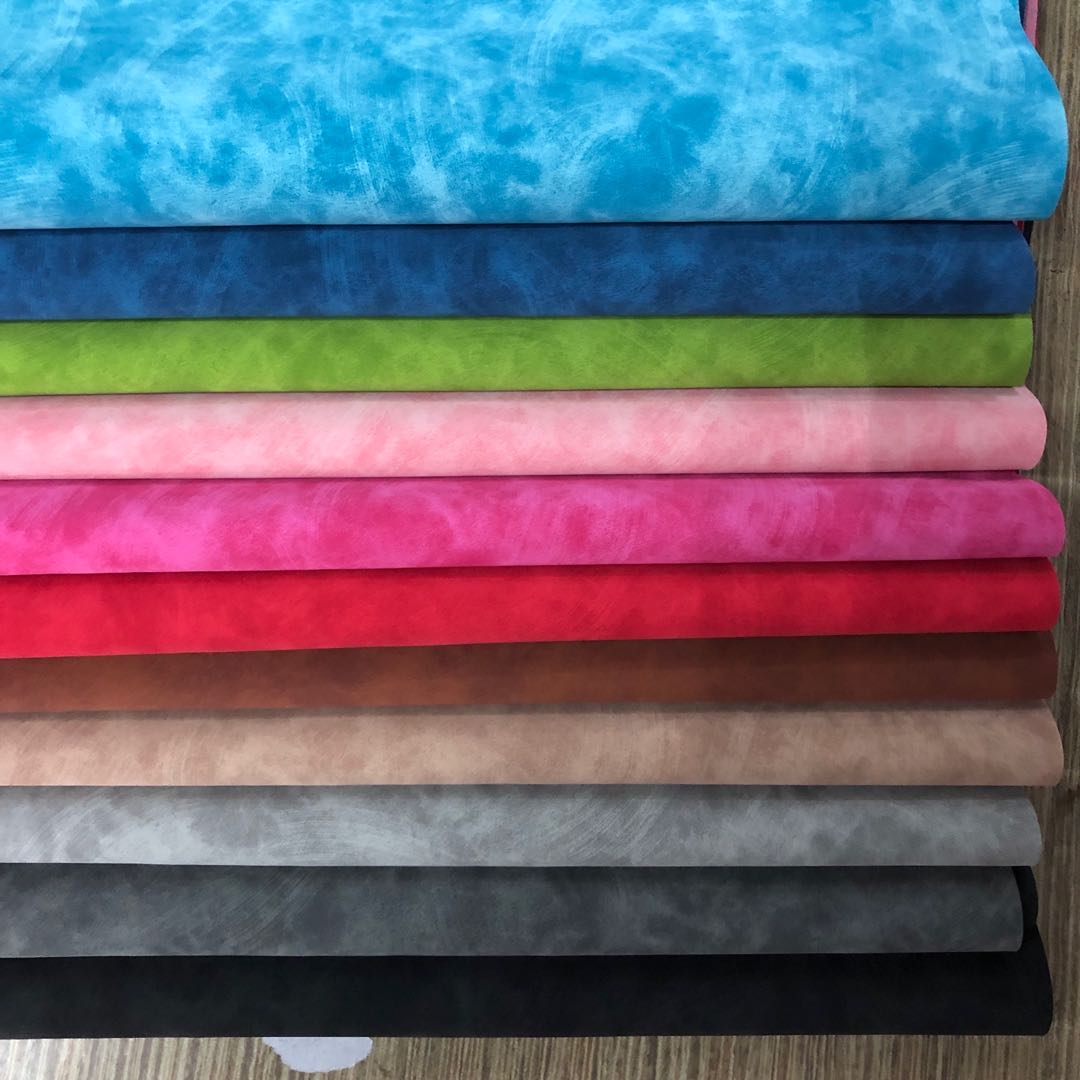 Factory direct sales of PU skin-like velvet surface embossed PU leather bag texture packaging box fabric can be embossed with Logo Application Scenario