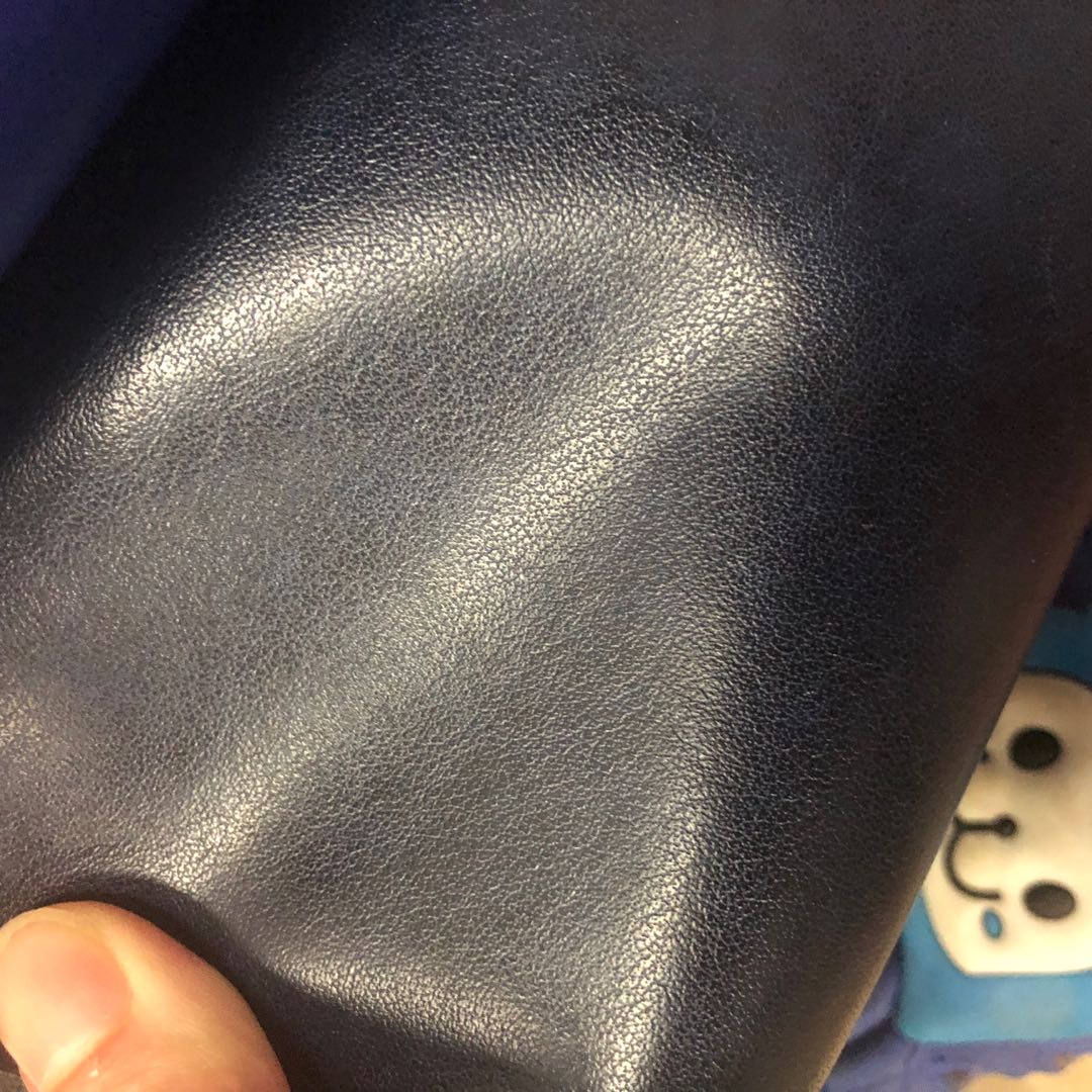 Factory direct sales of pressure-changed Pu leather bags, stationery leather, trademark leather, color-changing fine texture pu material Item Picture
