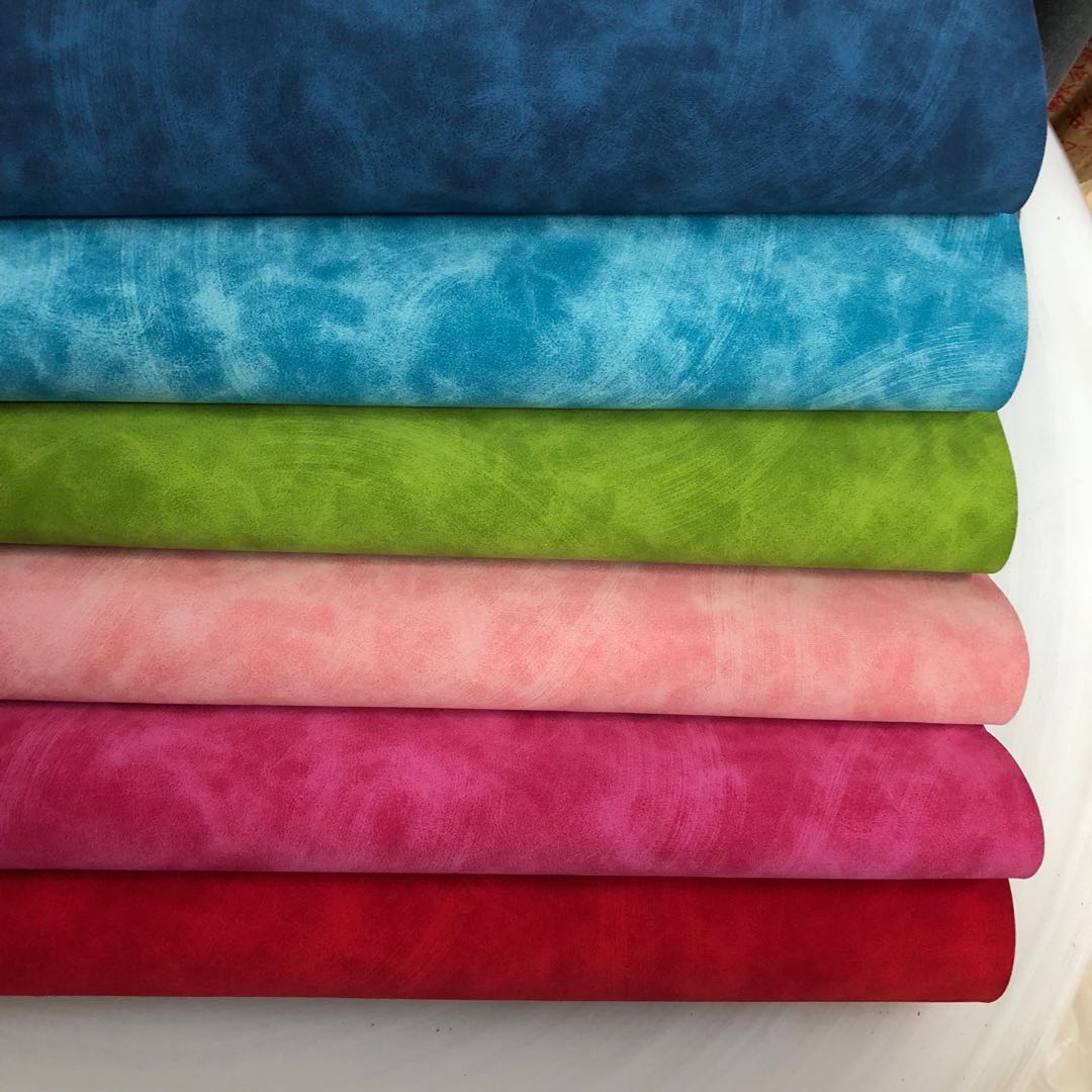Factory direct sales of PU skin-like velvet surface embossed PU leather bag texture packaging box fabric can be embossed with Logo undefined