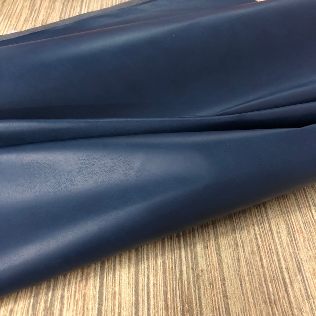 Factory direct sales of small wood grain pu leather fabric, embossed leather color-changing trademark leather bag fabric undefined