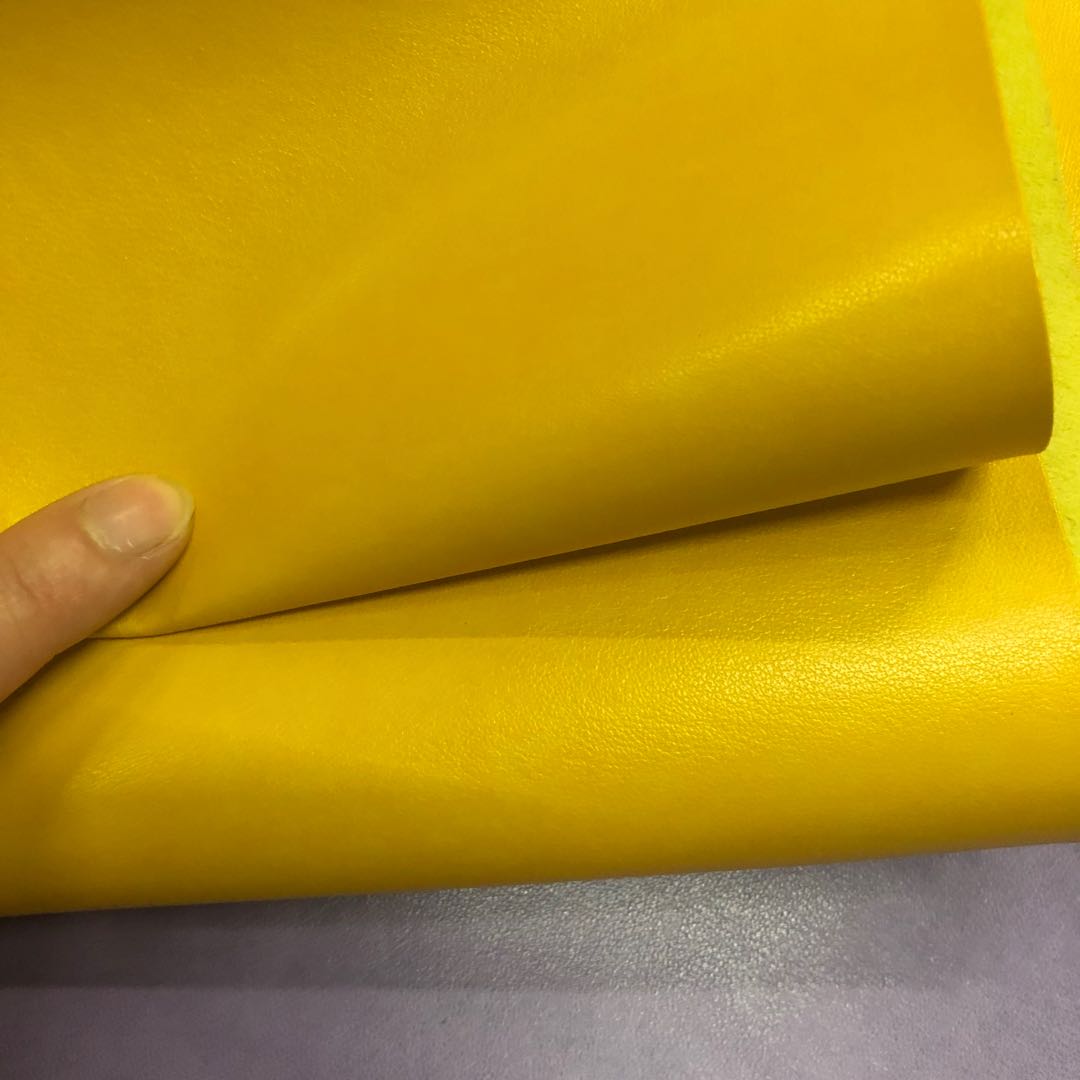 Factory direct sales of pressure-changed Pu leather bags, stationery leather, trademark leather, color-changing fine texture pu material Application Scenario