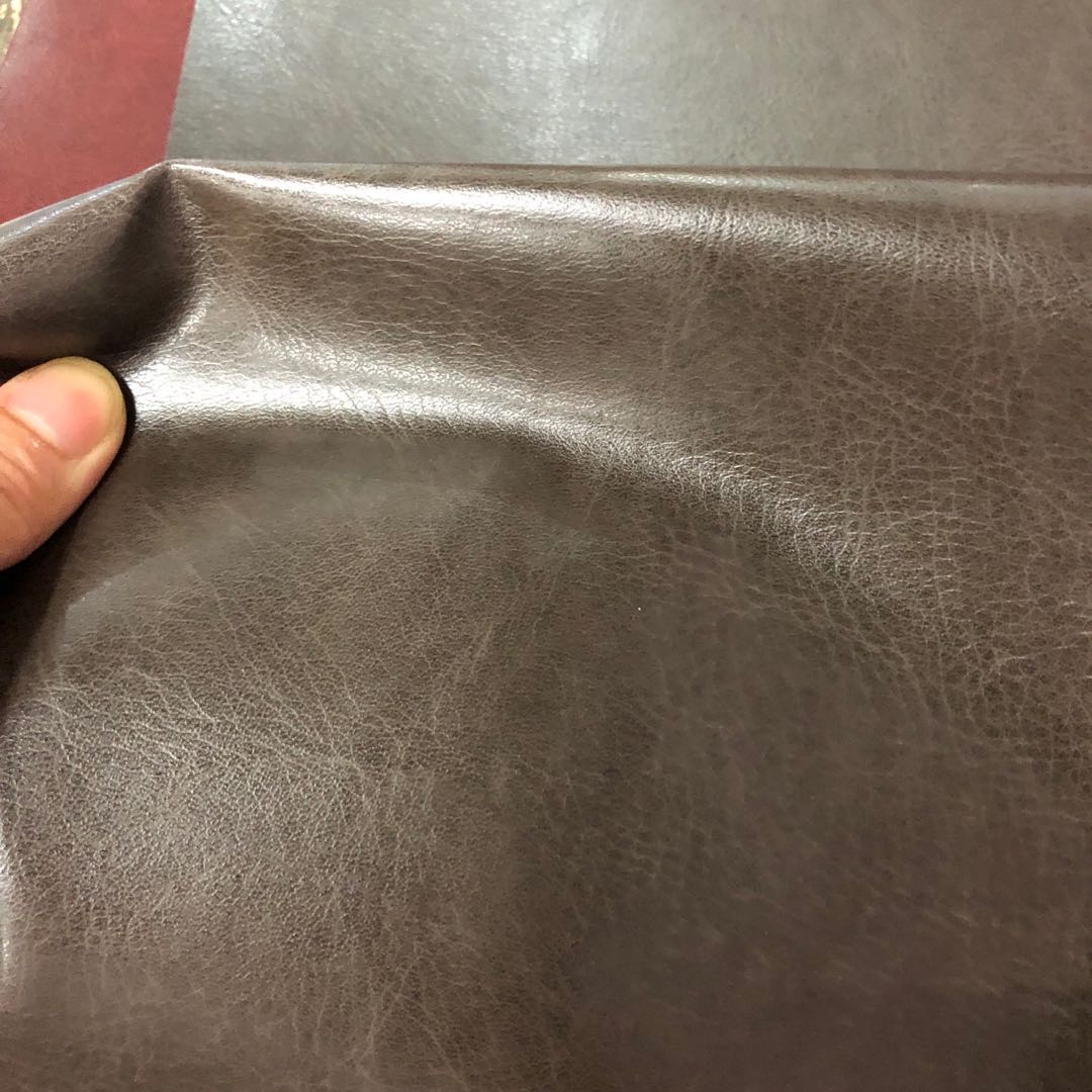 Factory direct sales of pressed PU leather brand leather crystal cowhide bag fabric undefined