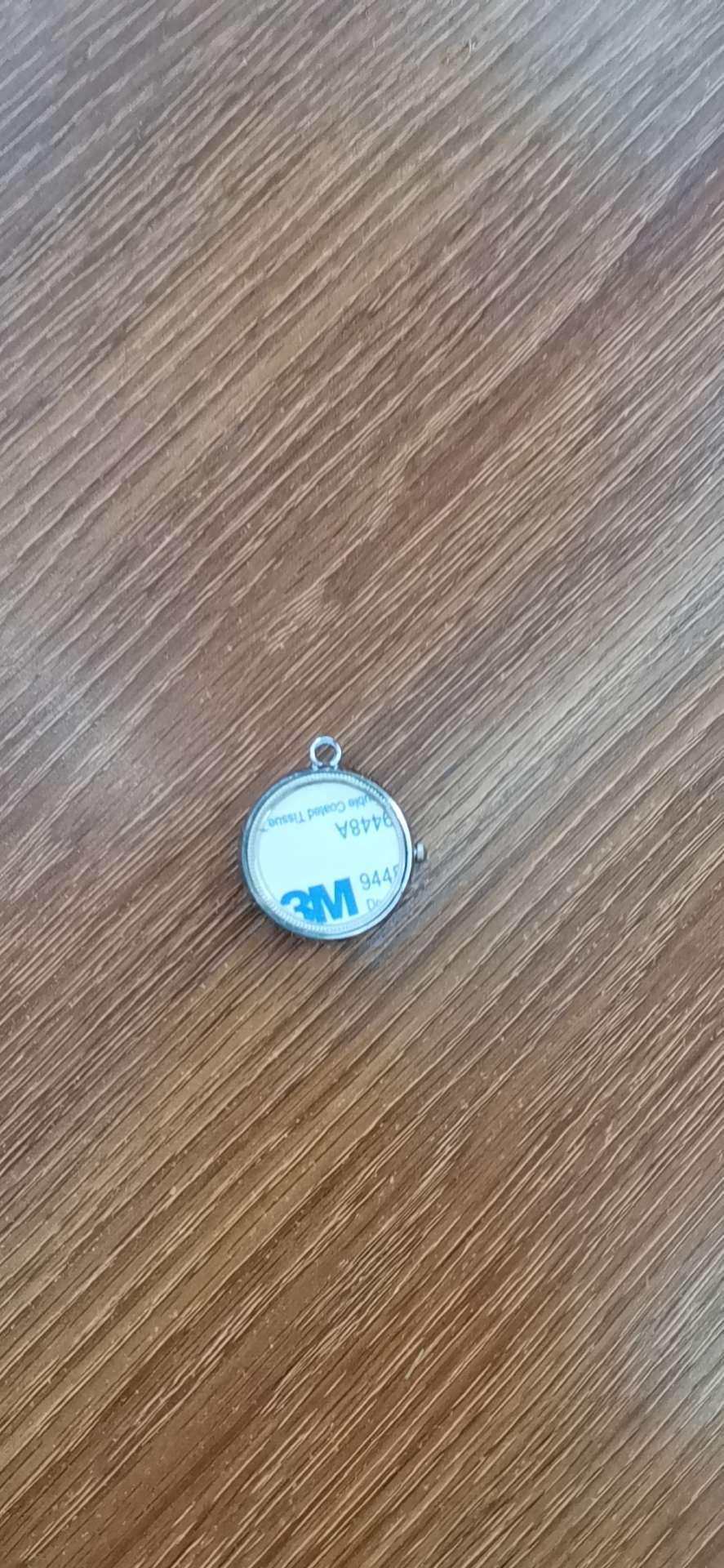 Silver rotating gyroscope pocket watch