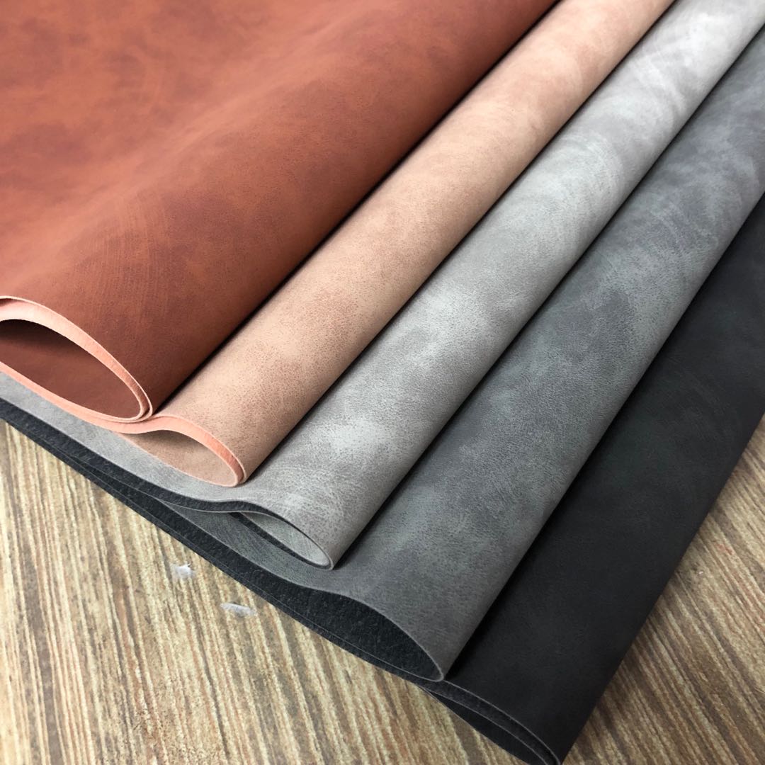 Factory direct sales of PU skin-like velvet surface embossed PU leather bag texture packaging box fabric can be embossed with Logo details Picture