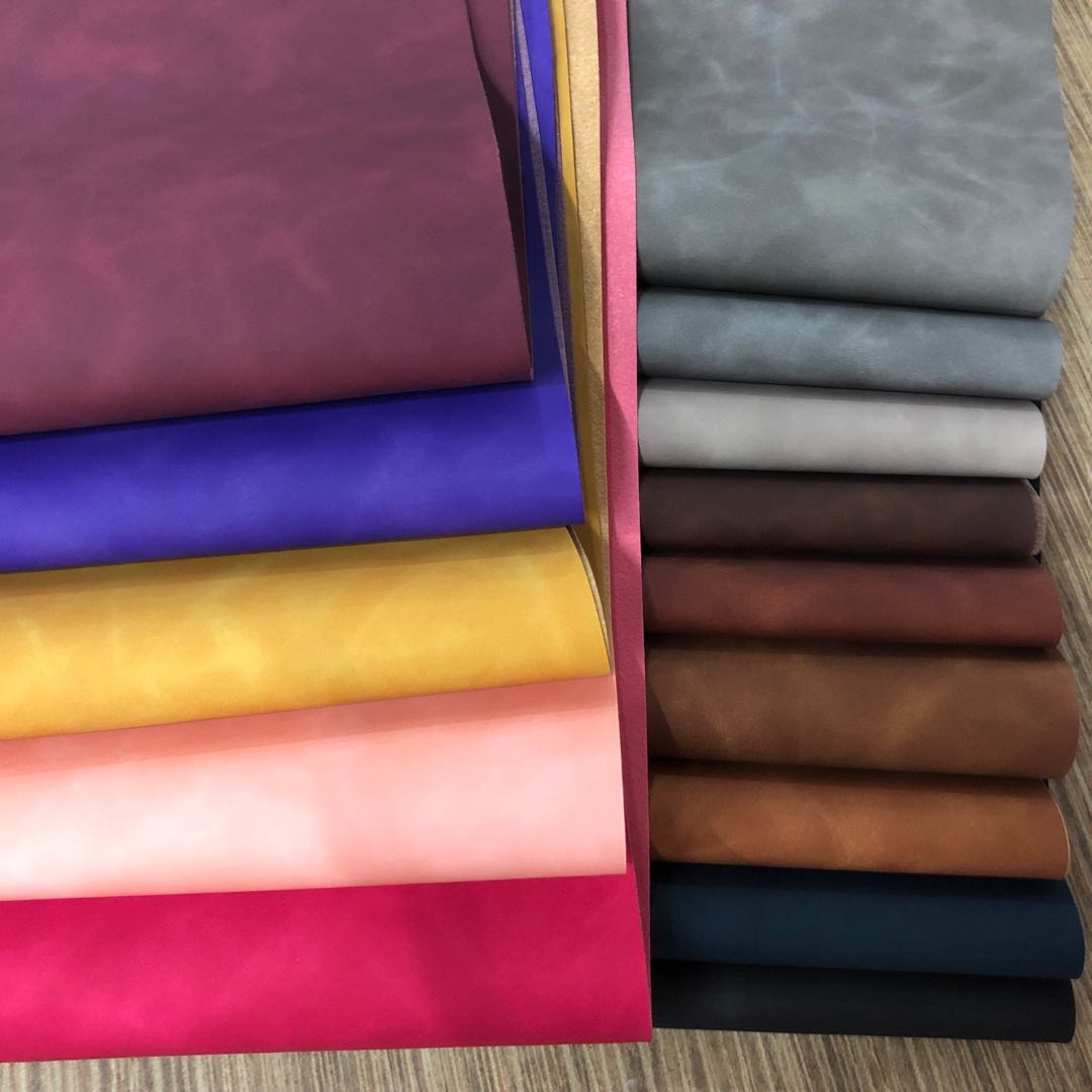 Factory direct sales of new pressure-changed PU color-changing leather with a skin-like feel, dreamy bag leather packaging box, notebook cover leather undefined