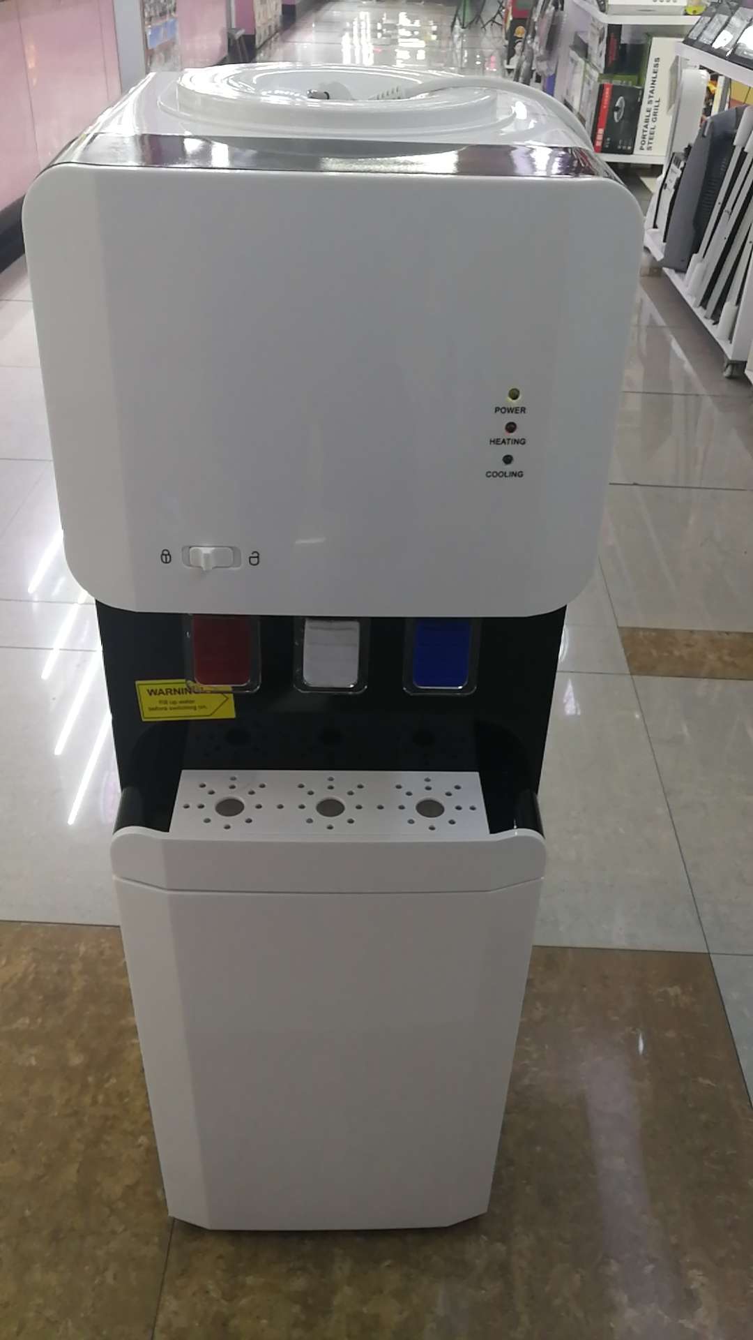Electronic refrigeration water dispenser