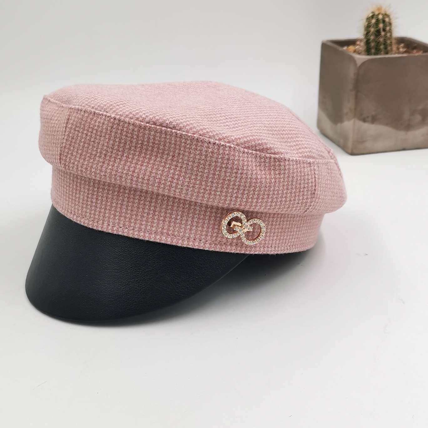 Pins adorn military caps thumbnail