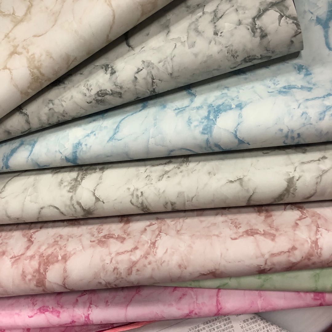 Factory direct sales of compression molded leather PU marble-patterned leather packaging box fabric for luggage and stationery Application Scenario