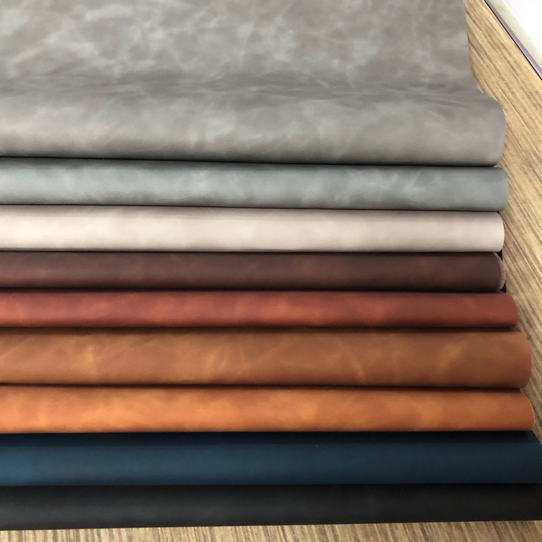 Factory direct sales of new pressure-changed PU color-changing leather with a skin-like feel, dreamy bag leather packaging box, notebook cover leather details Picture