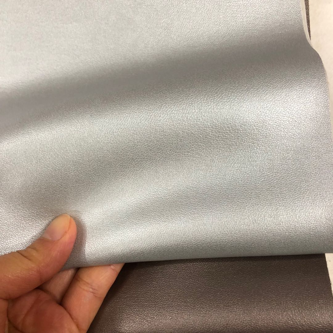 Factory direct sales of pearlescent colored sheep eco-friendly leather-textured pvc leather bags, handbags, sofa fabrics, stationery boxes, packaging and jewelry box materials undefined