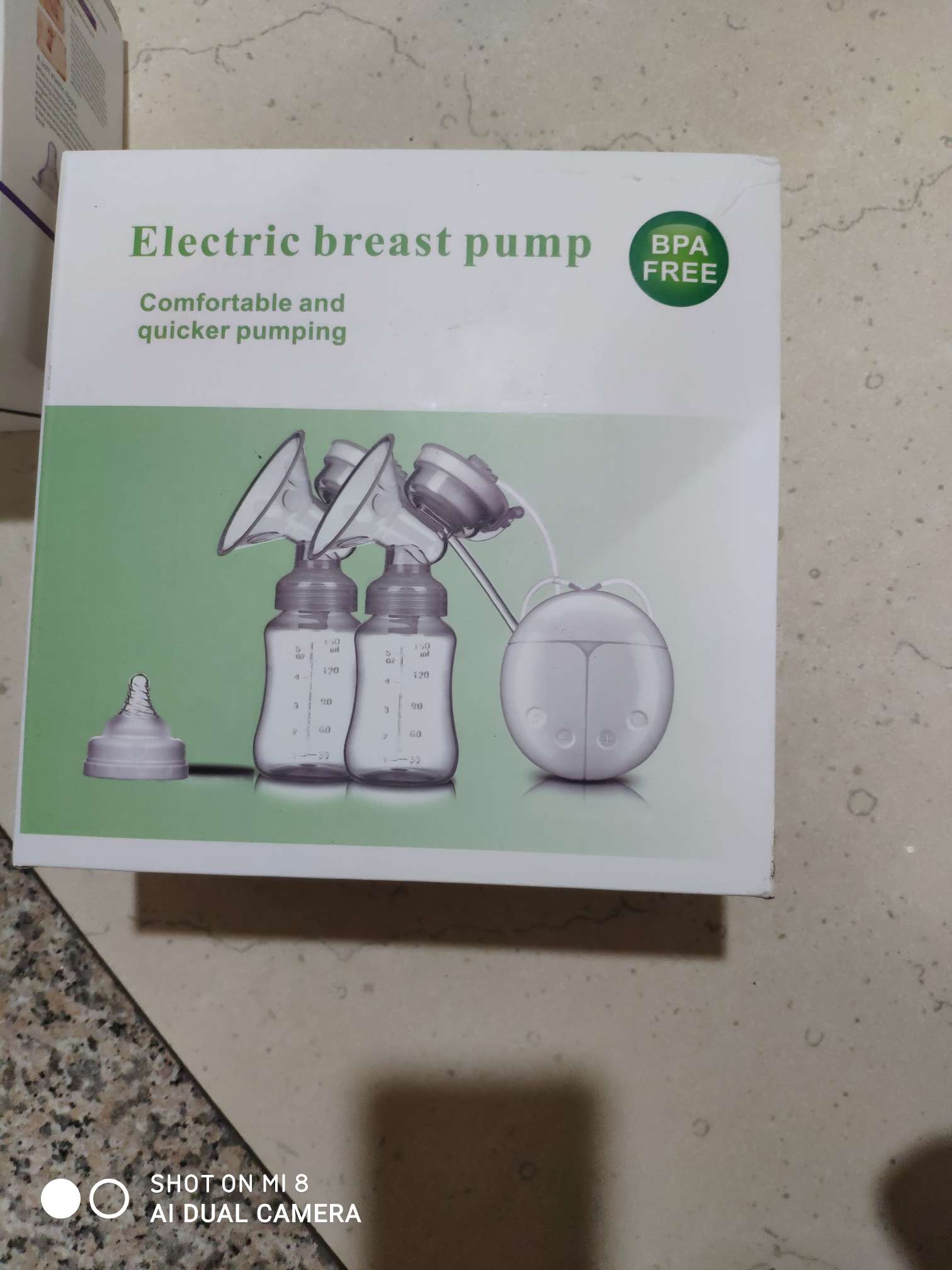 母婴自动吸奶器