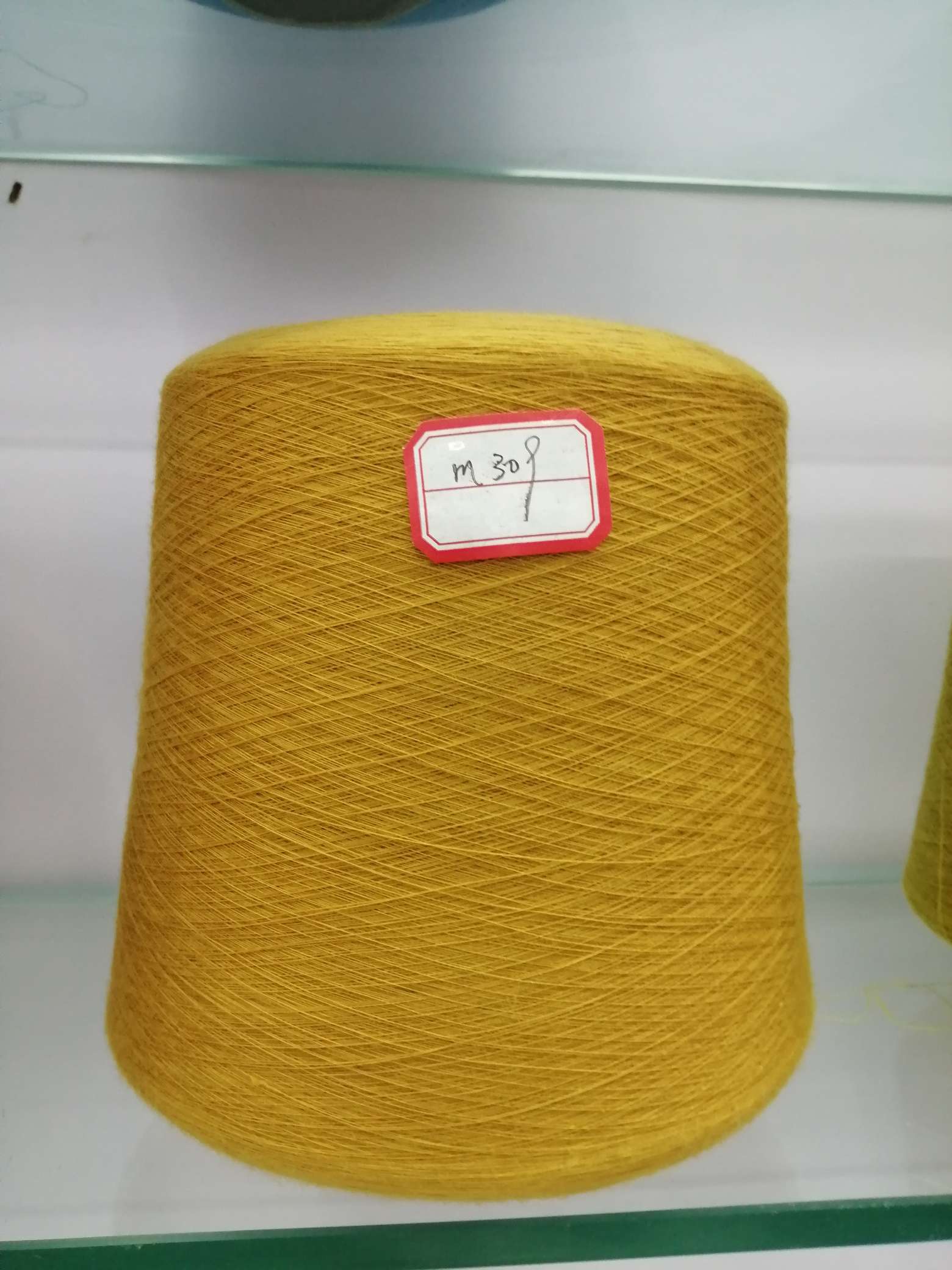 Colored fixed dyeing polyester 16S, 21S, 32S large chemical fiber knitted dyed yarn silver gray old yellow