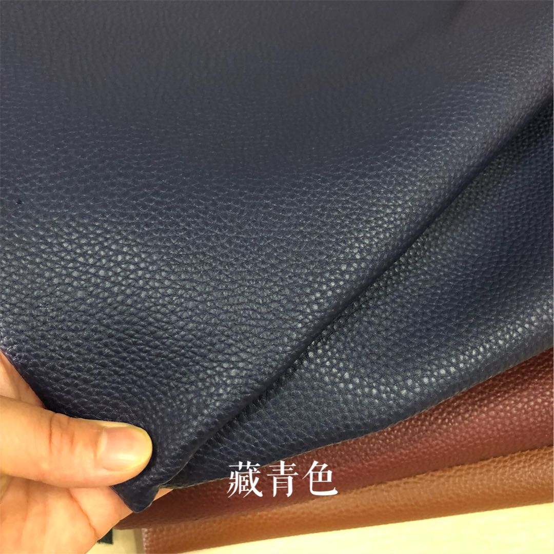 Factory direct sales of all-PU large lychee patterned leather fabric for luggage, leather and faux leather for sofas, with a soft touch undefined