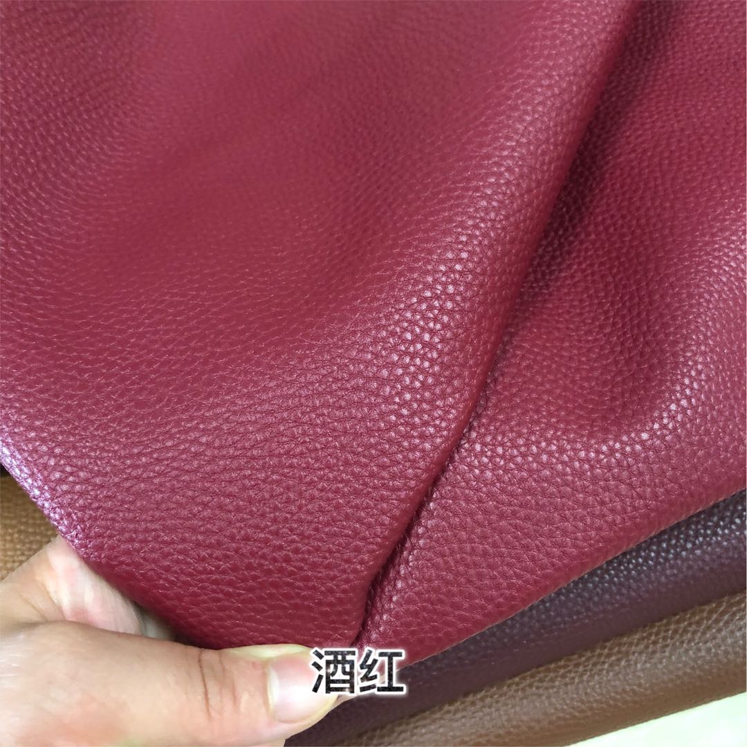 Factory direct sales of all-PU large lychee patterned leather fabric for luggage, leather and faux leather for sofas, with a soft touch undefined