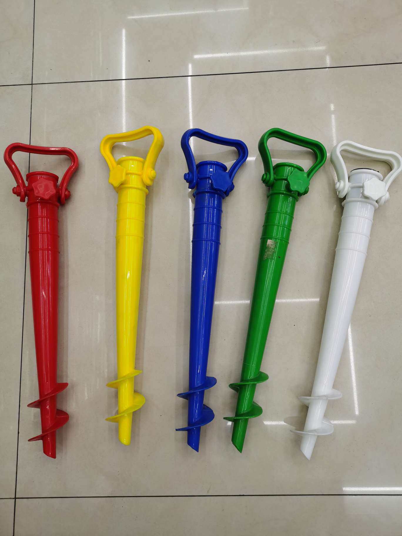 Plastic fork base for beach umbrellas