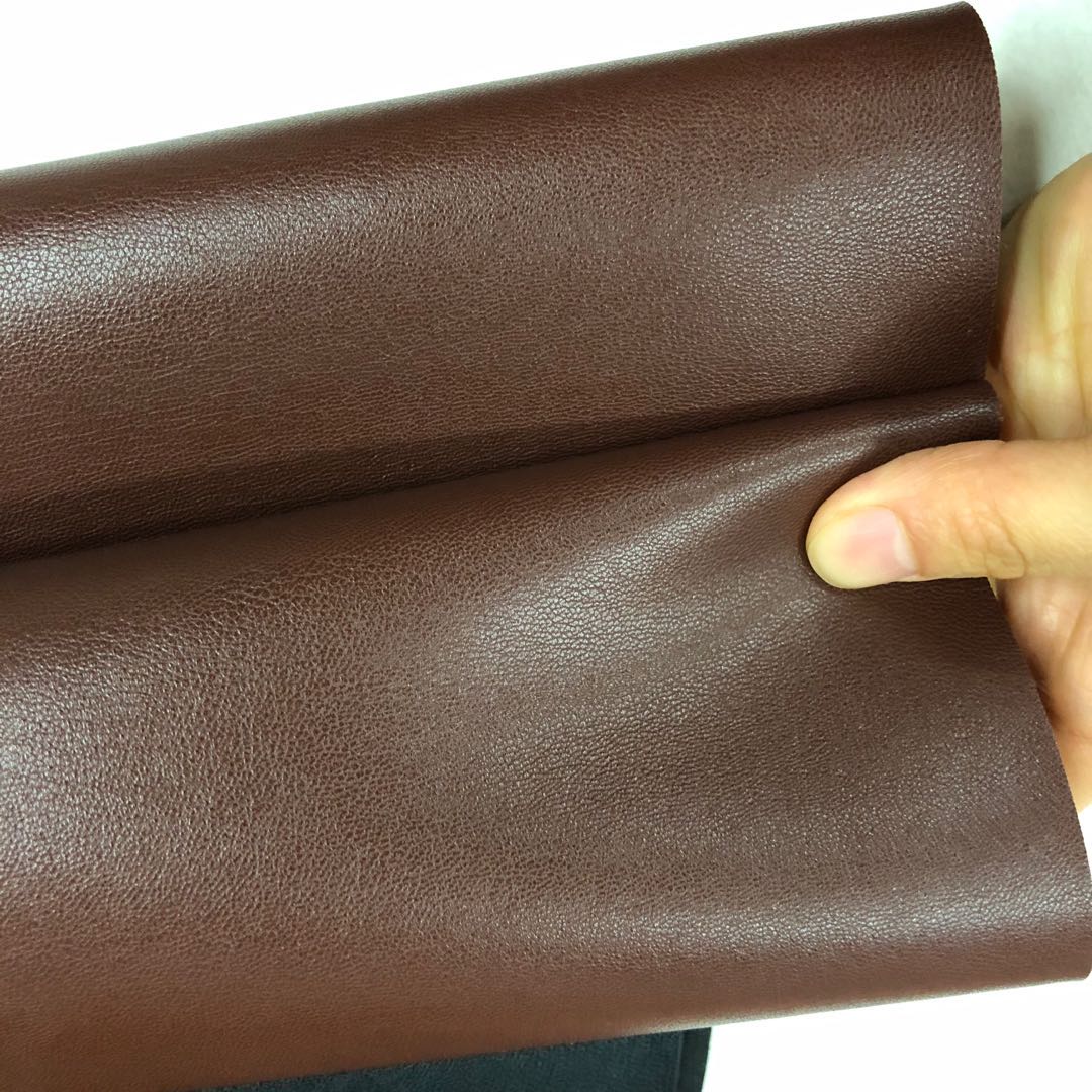 Factory direct sales of 8415 medium and coarse sheepskin pvc leather high-quality textured base fabric eco-friendly luggage fabric Application Scenario