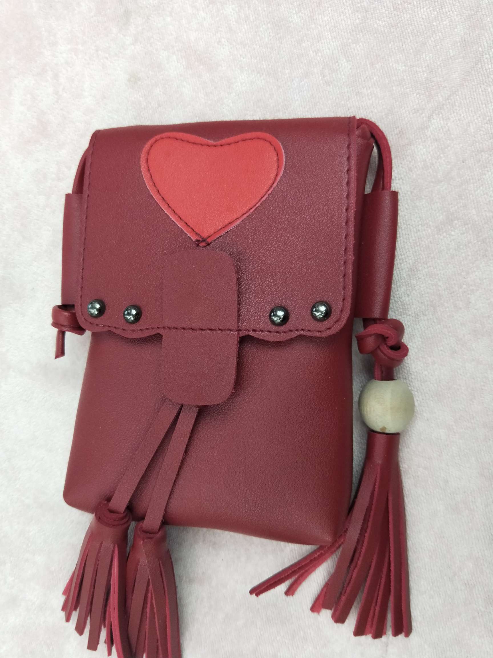 单肩包爱心珠珠